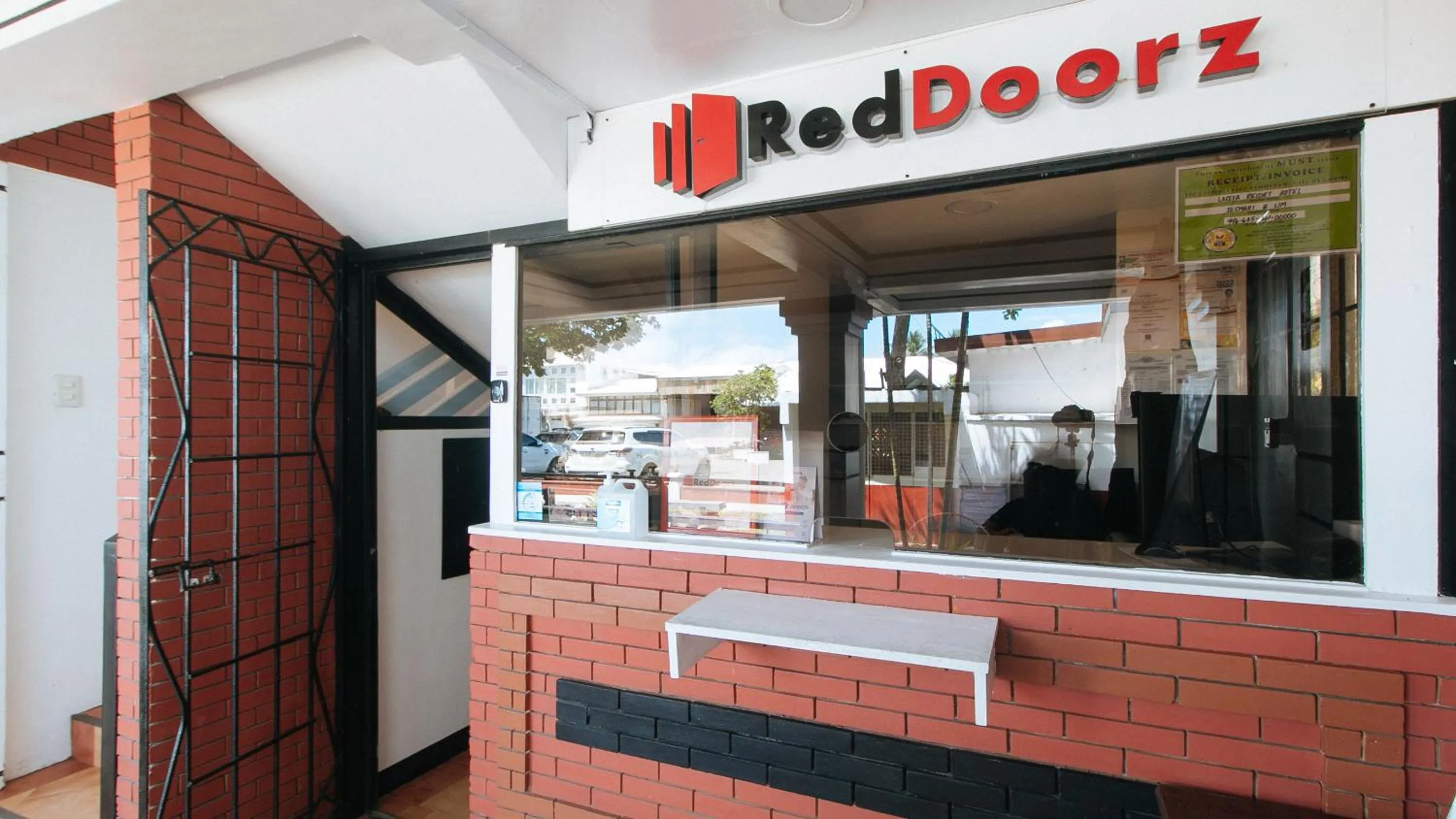 Property logo or sign in RedDoorz at La Sefa Hotel and Resort Atimonan