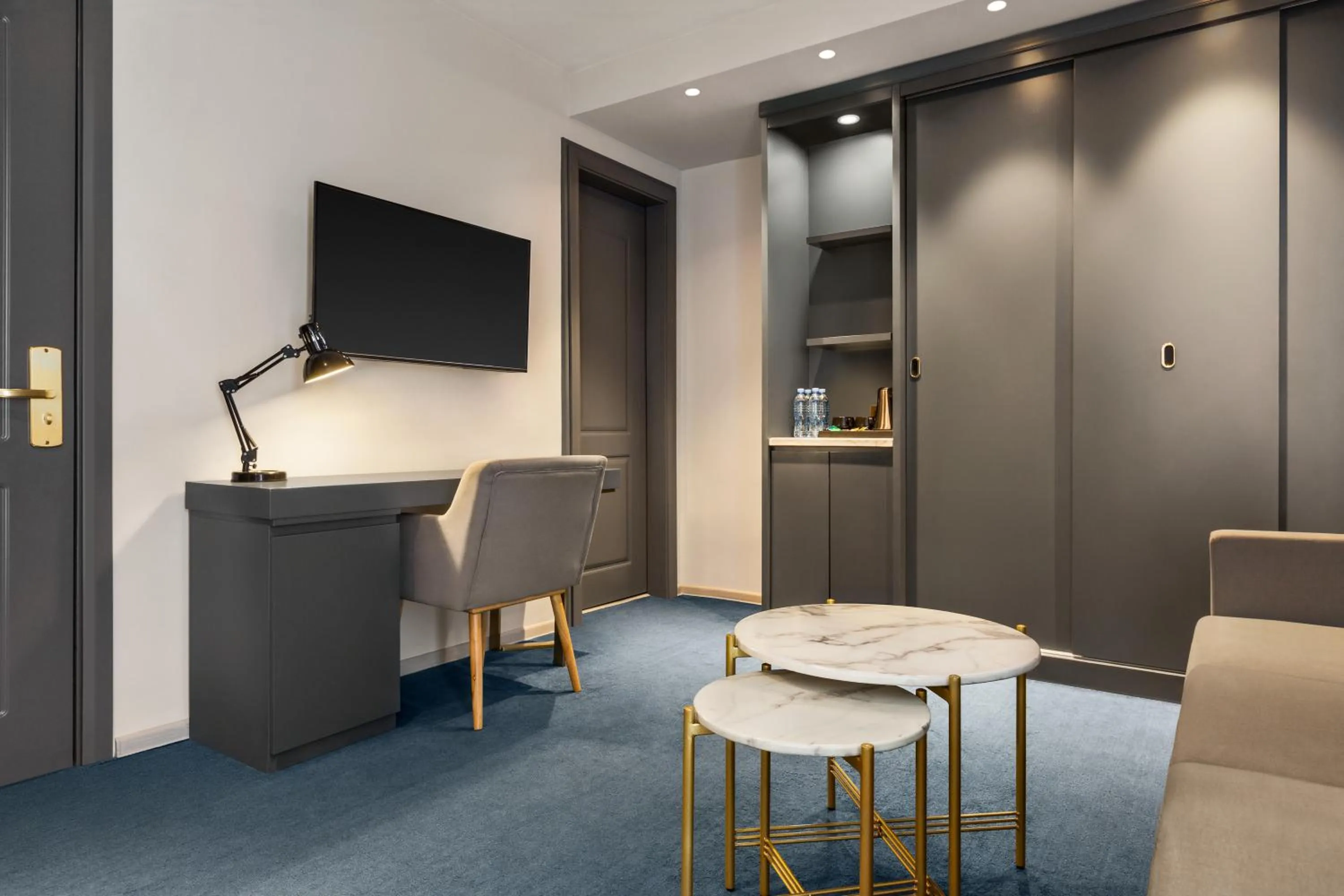 Communal lounge/ TV room in Ramada by Wyndham Tbilisi Old City