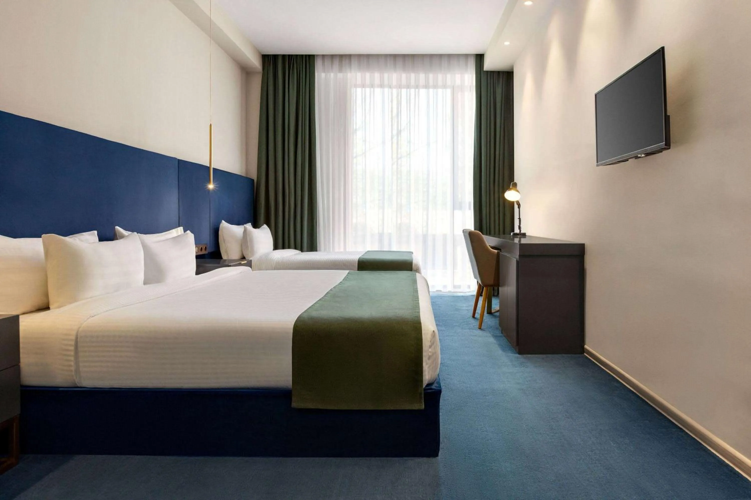 Photo of the whole room, Bed in Ramada by Wyndham Tbilisi Old City