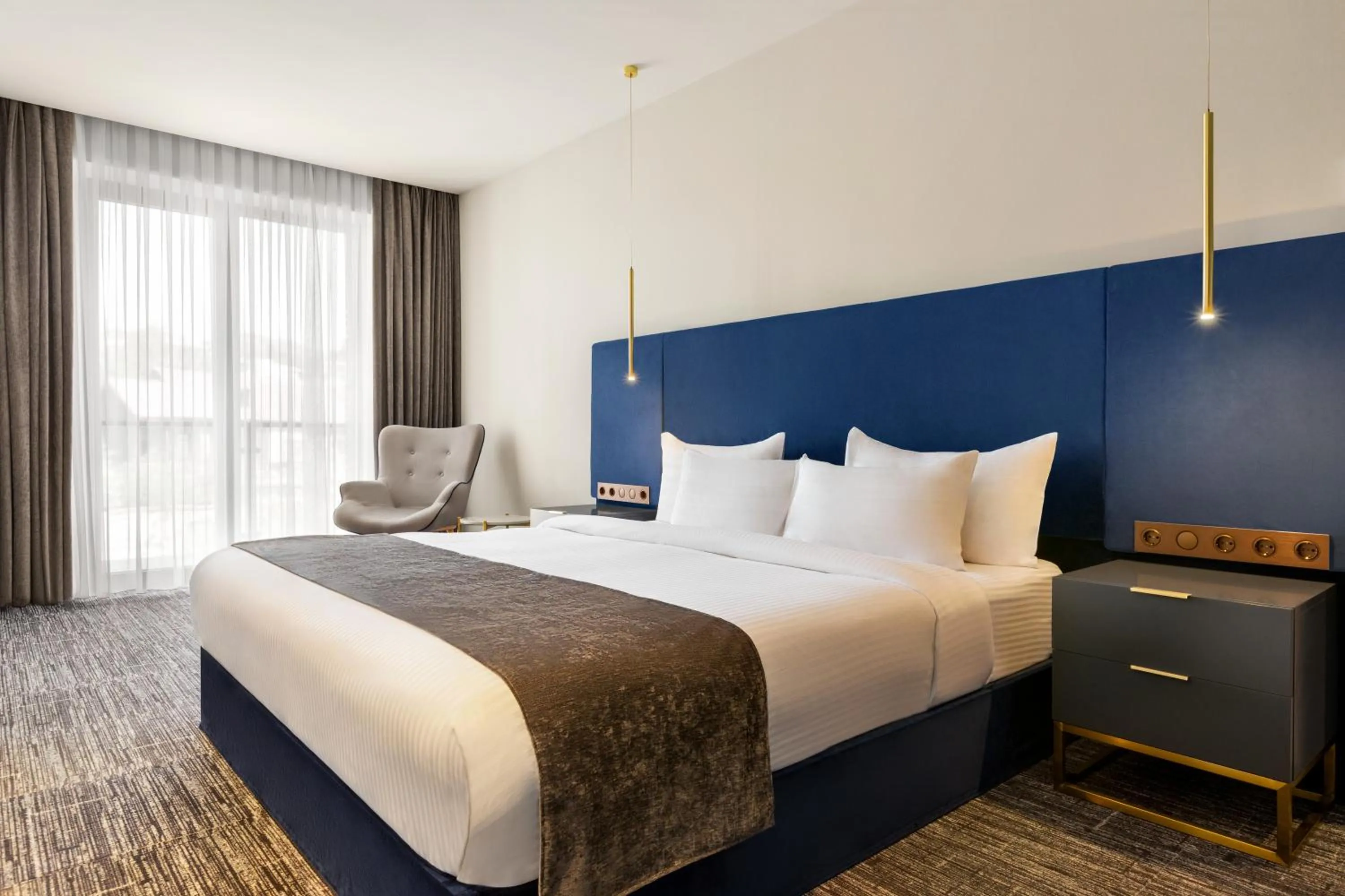 Bed in Ramada by Wyndham Tbilisi Old City