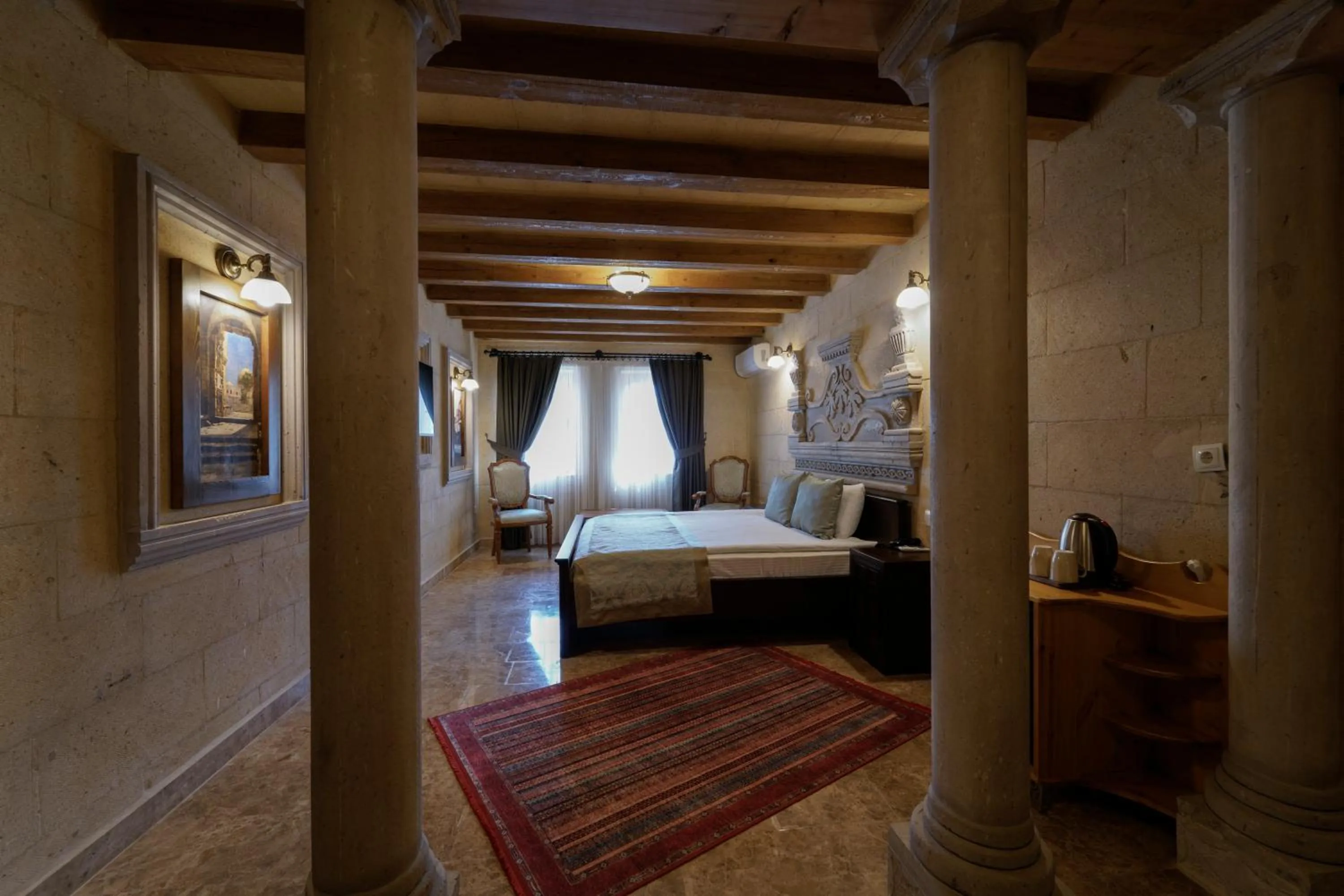 Seating area, Bed in Cratus Stone Palace
