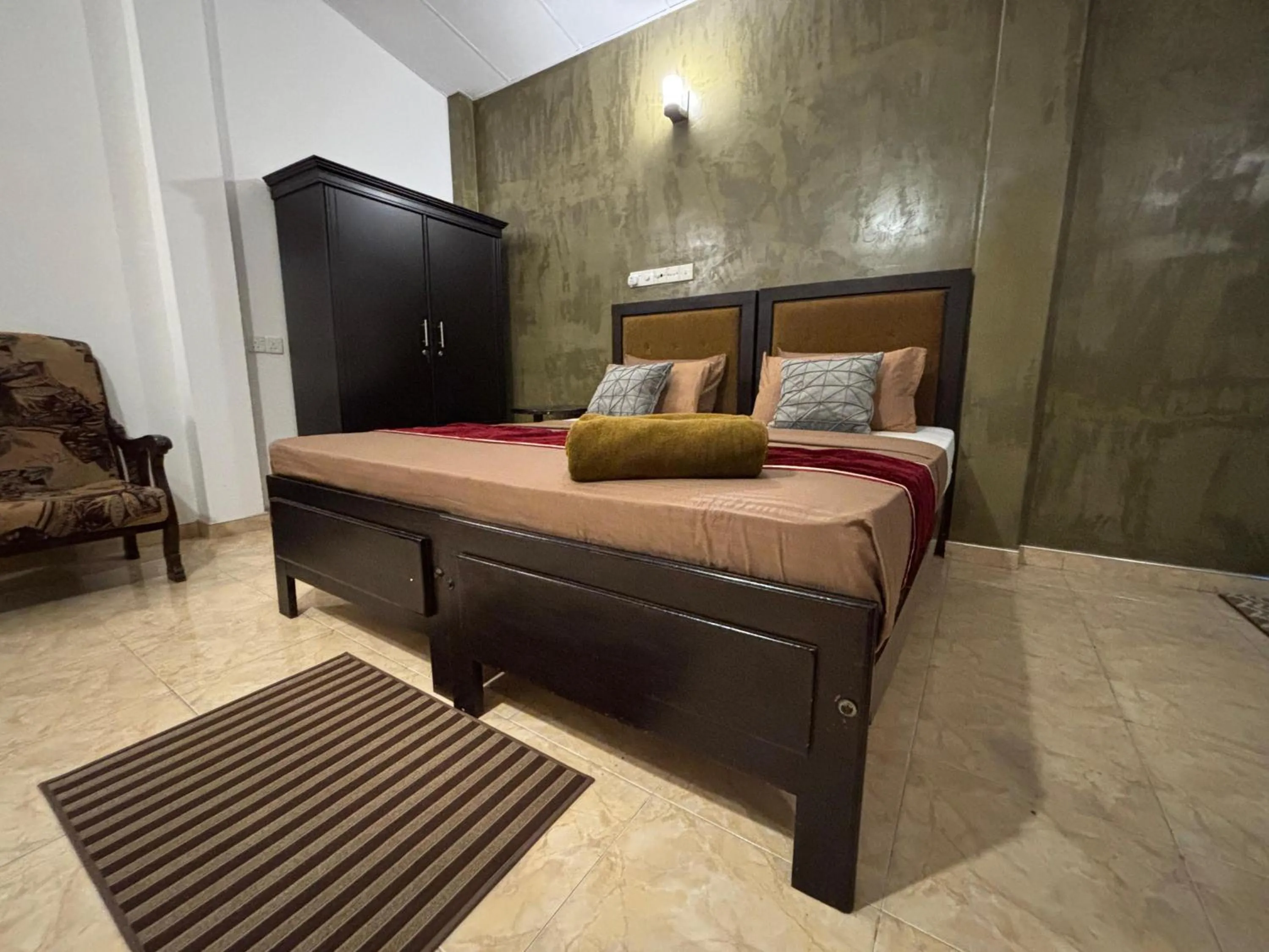 Bed in Kismet Rest Mirissa