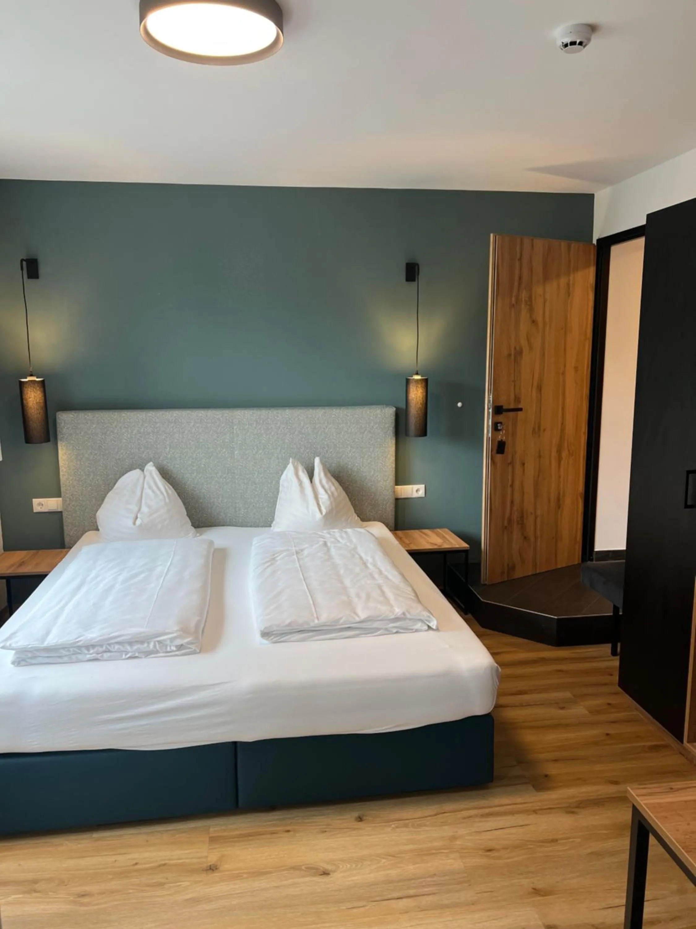 Photo of the whole room, Bed in Wander- und Familienhotel Erika