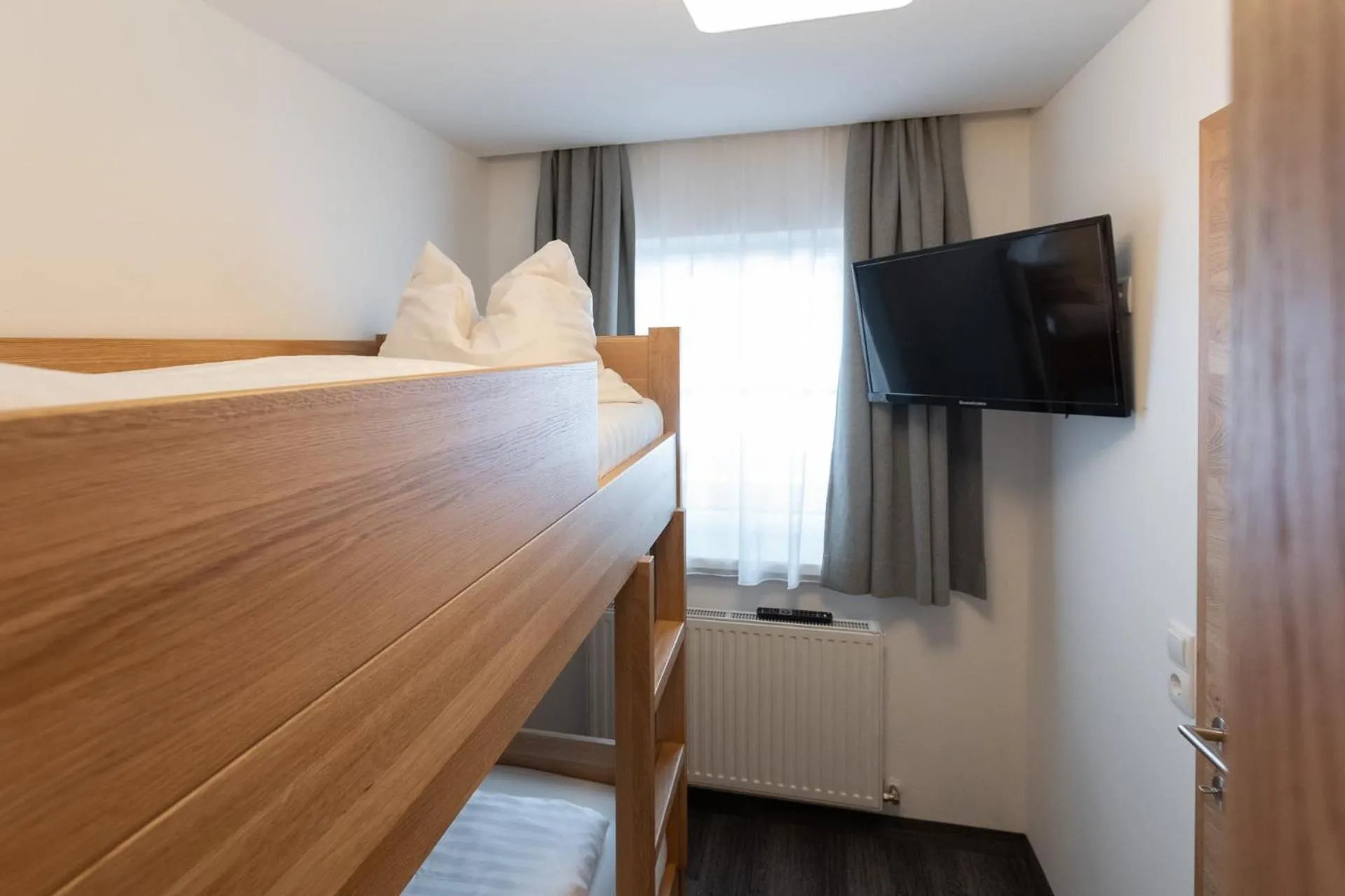 Photo of the whole room, Bed in Wander- und Familienhotel Erika