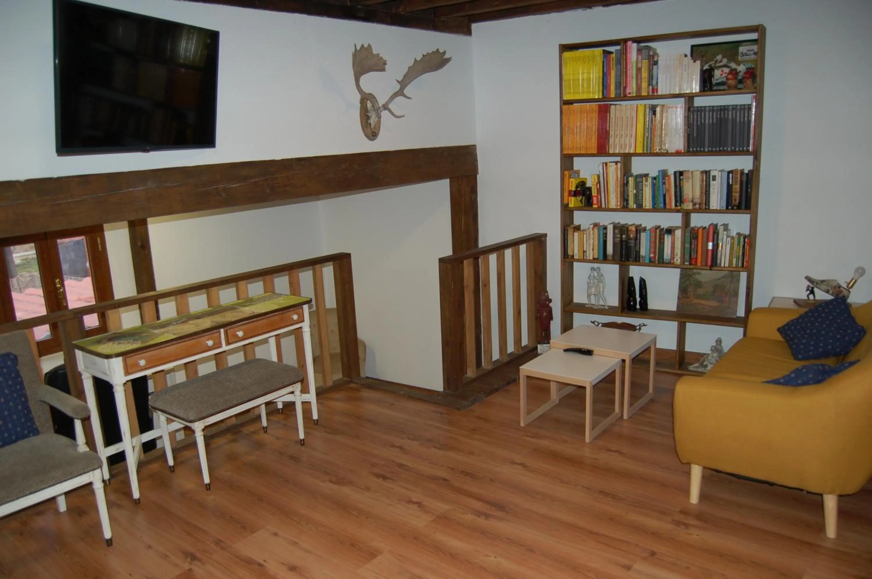 Communal lounge/ TV room in Posada Casa Juanes