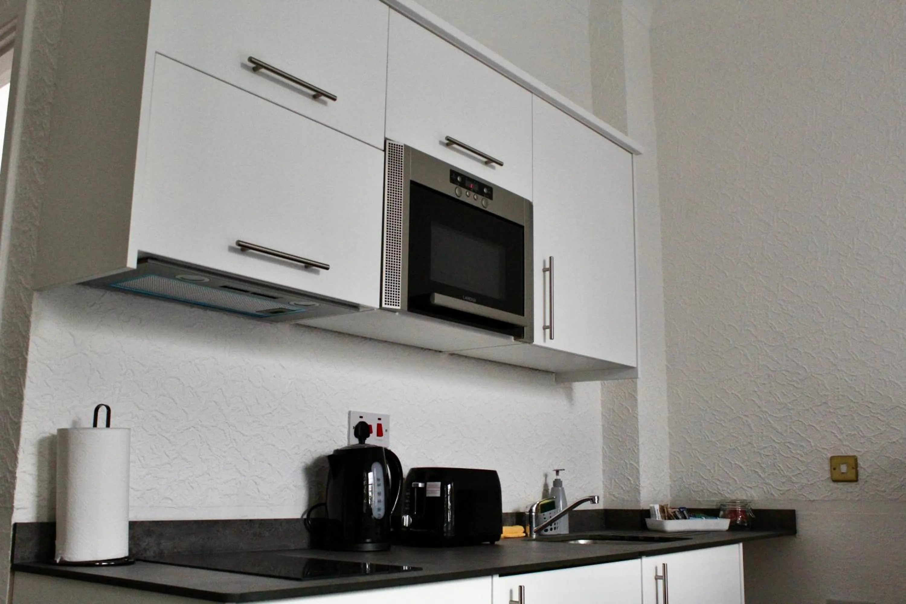 Bedroom in The Station Aparthotel