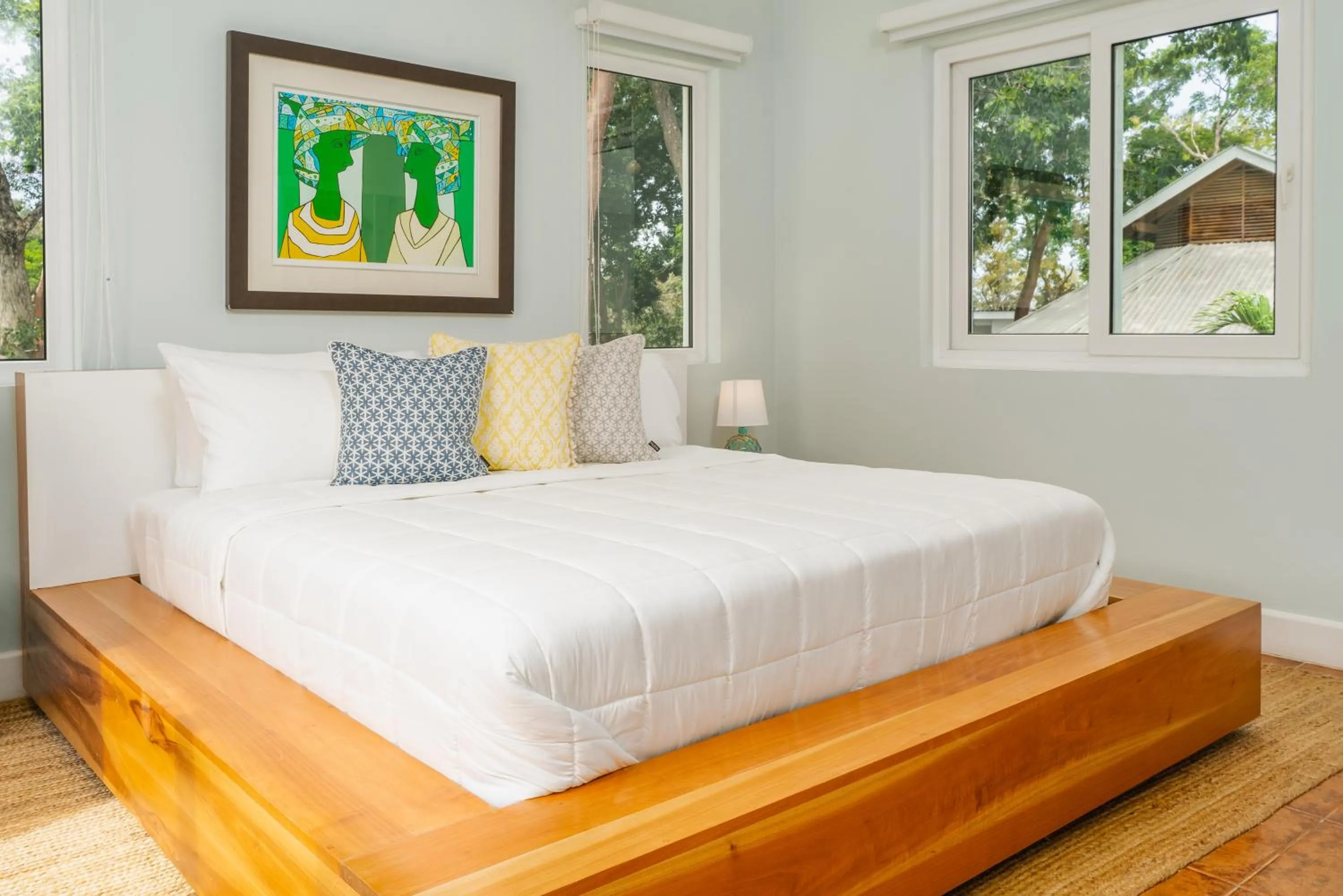 Bed in Blue Roatan Resort