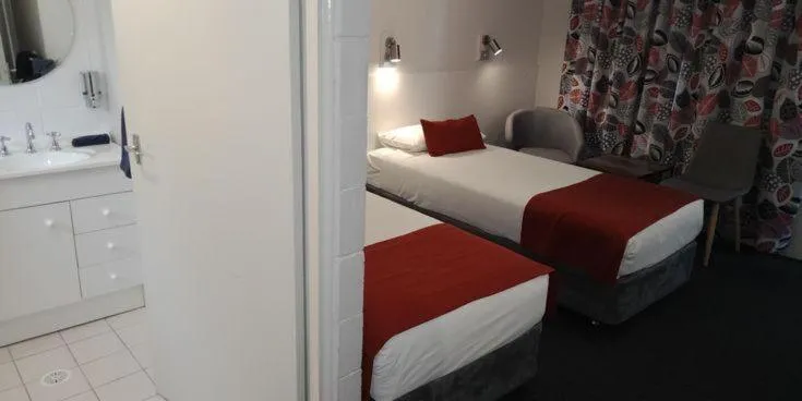 Bed in Lake Munmorah Motel