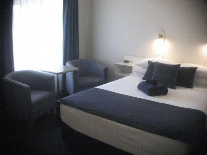 Bed in Lake Munmorah Motel