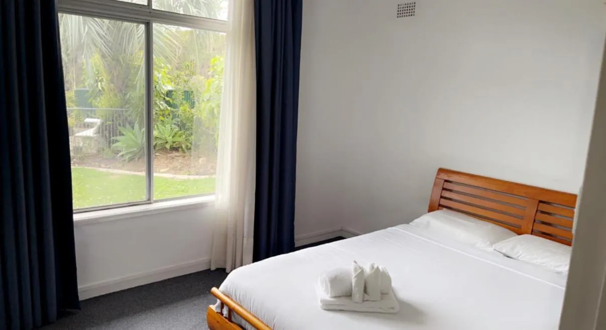 Bed in Lake Munmorah Motel