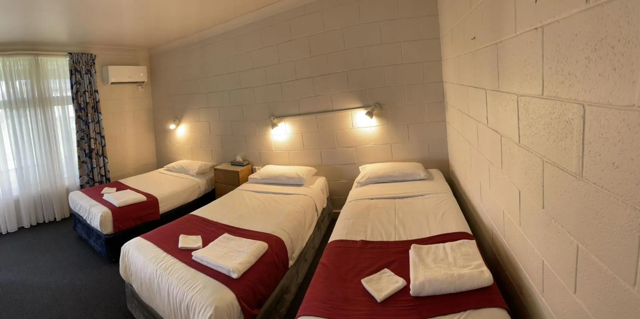 Bed in Lake Munmorah Motel