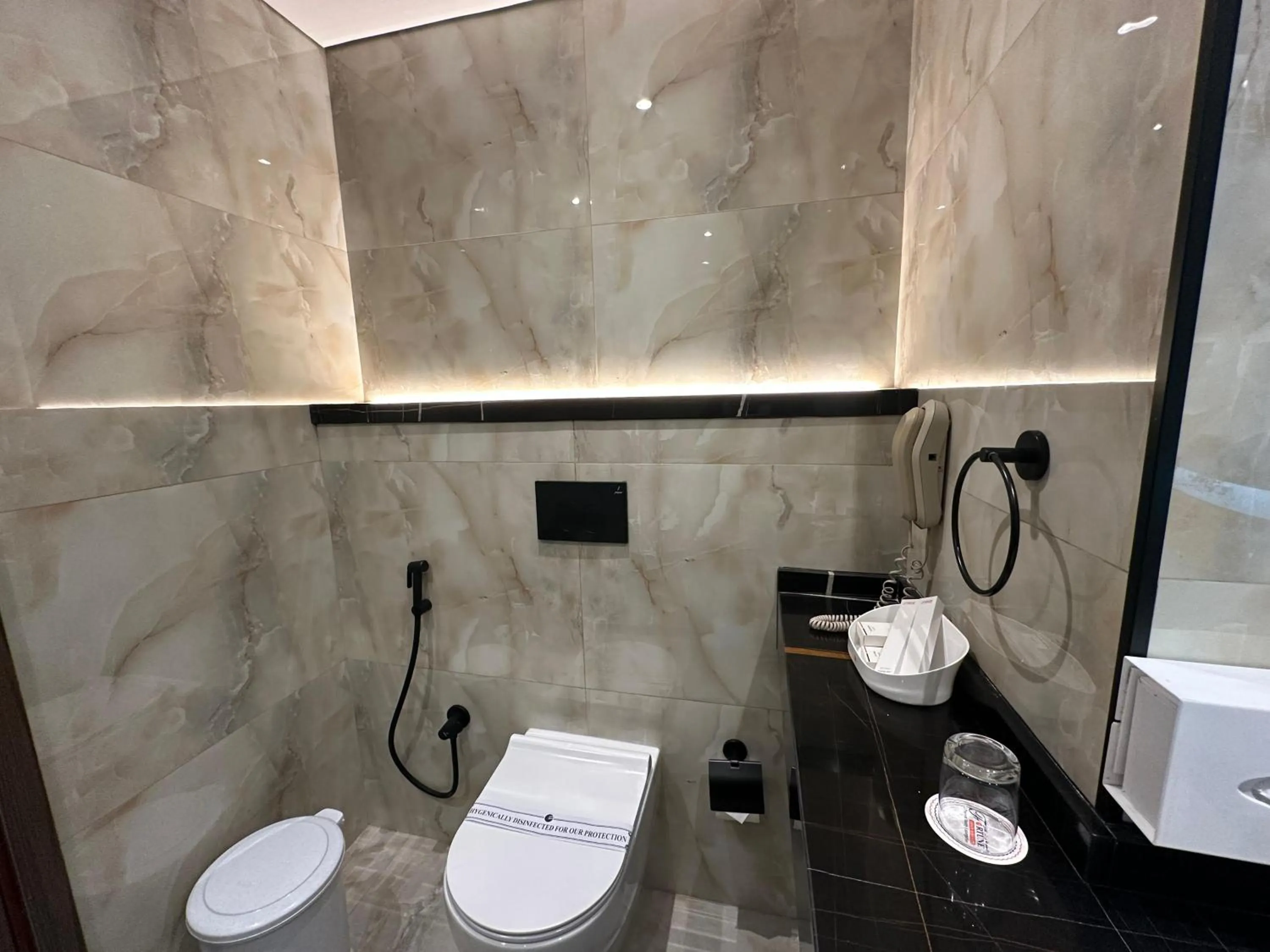 Bathroom in Dubai Grand Hotel by Fortune, Dubai Airport