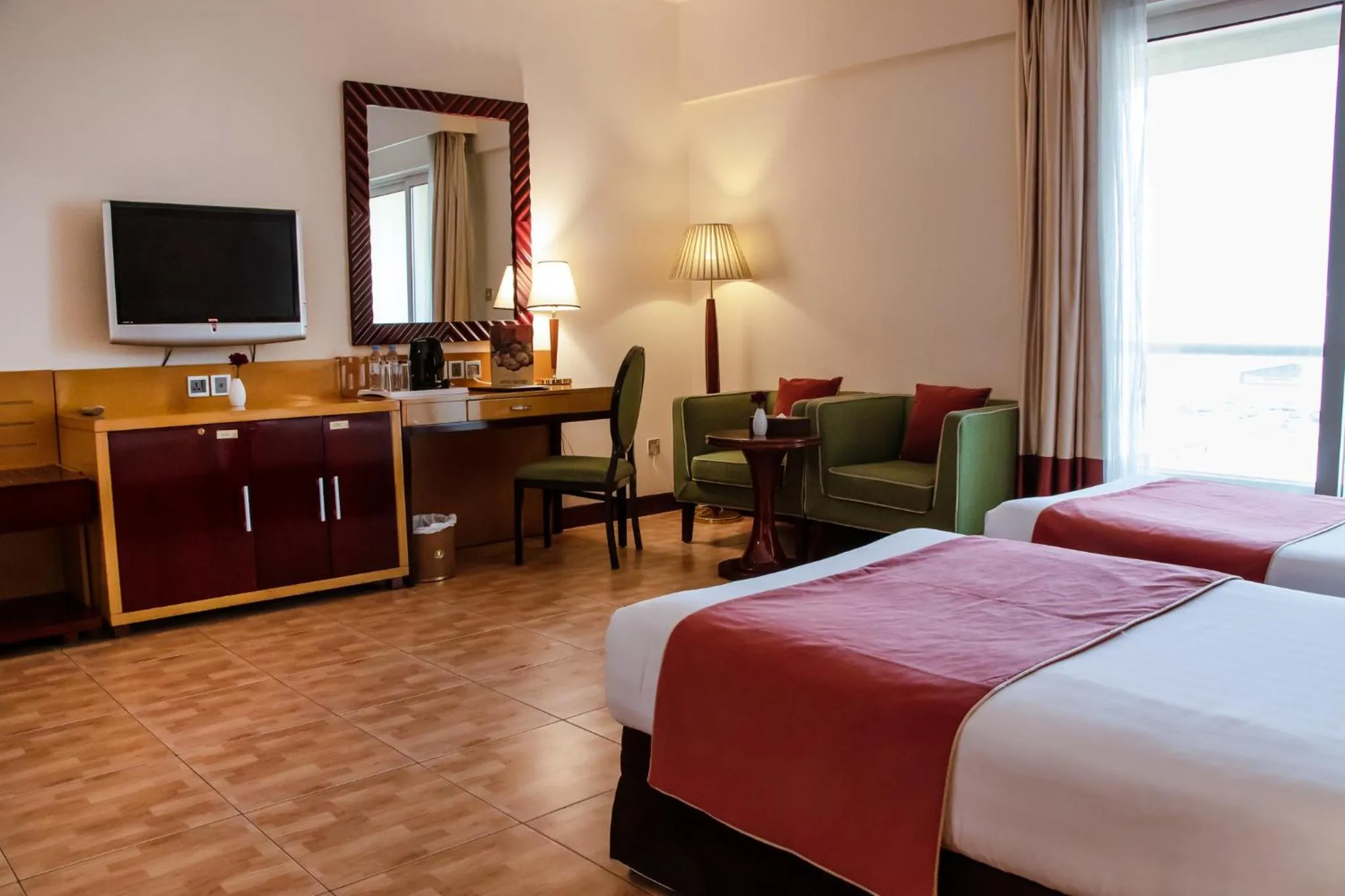 Communal lounge/ TV room, Bed in Dubai Grand Hotel by Fortune, Dubai Airport