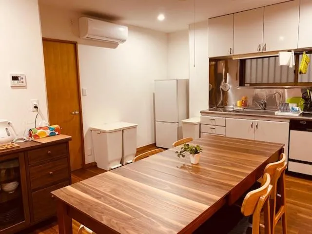 Kitchen or kitchenette in Ostay Numabukuro Hotel Apartment