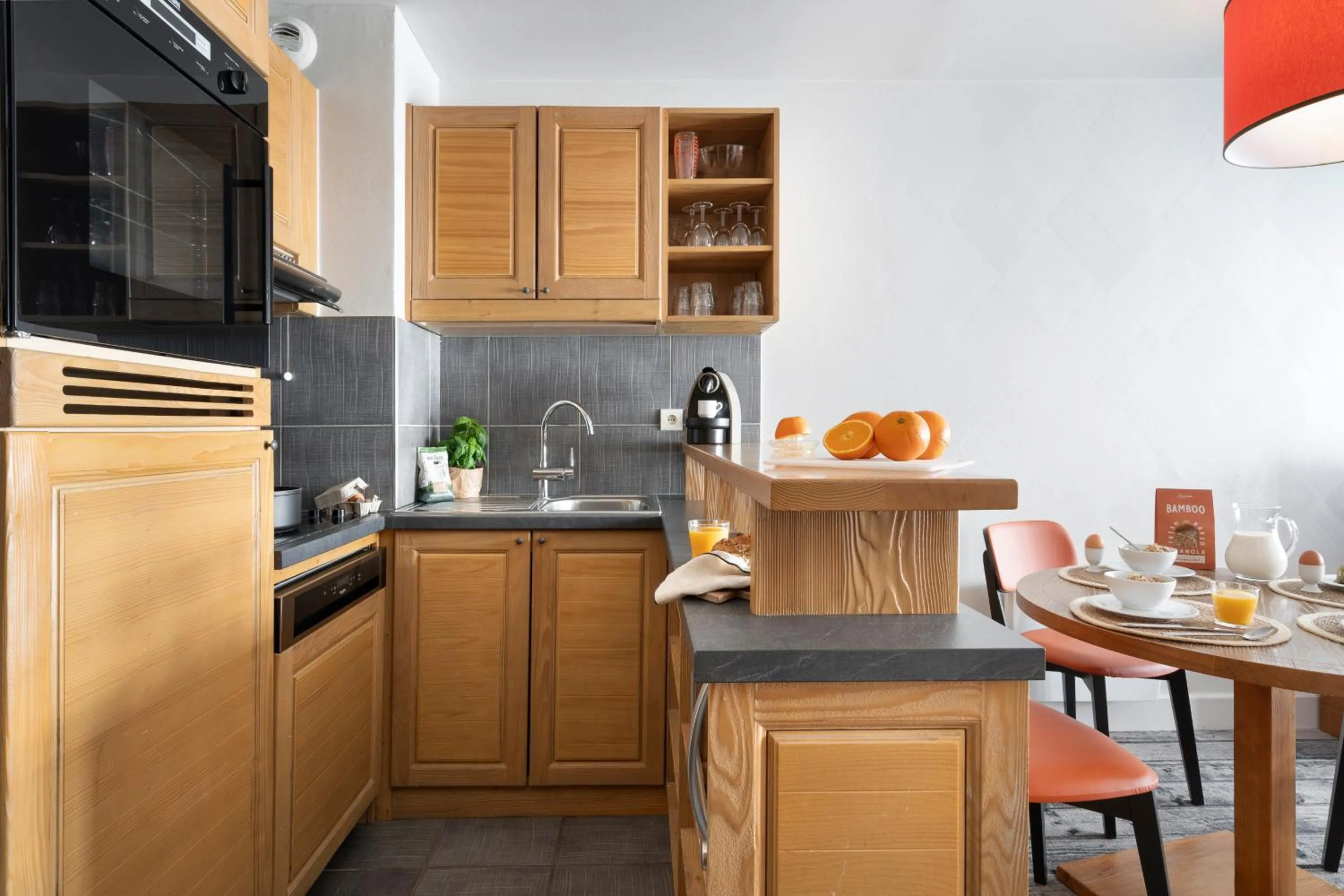 Kitchen or kitchenette in Résidence Pierre & Vacances Premium Les Terrasses d'Eos