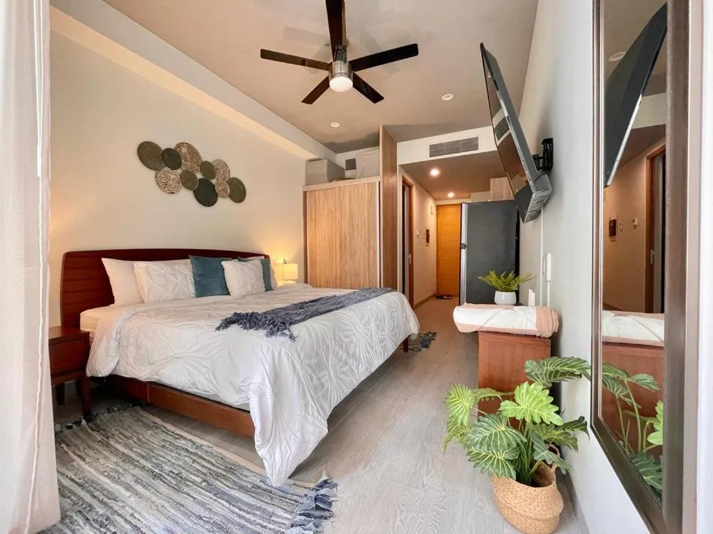 Bed in The Boat Condo by Andiani Travel