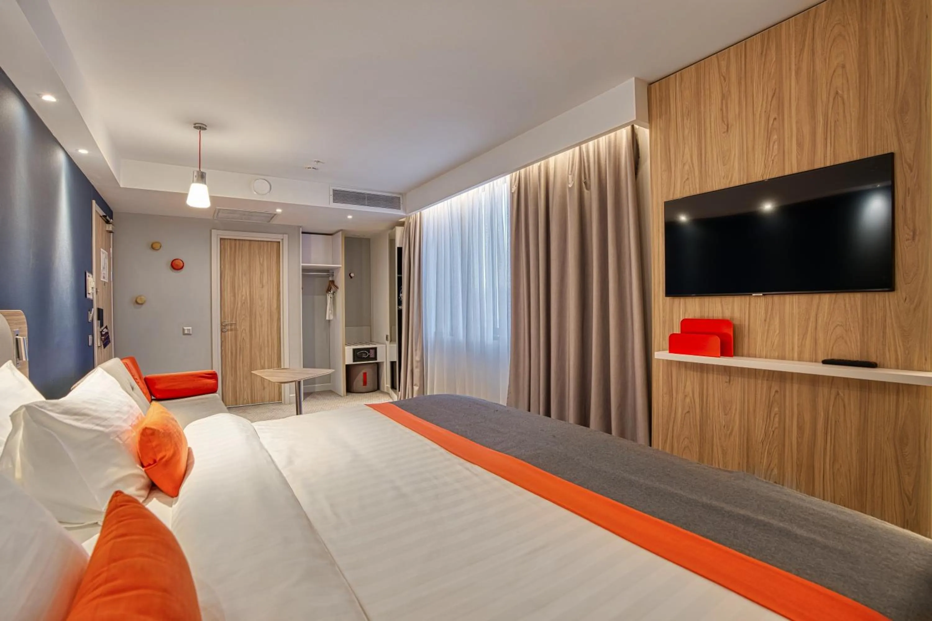 Bedroom, Bed in Holiday Inn Express - Almaty by IHG