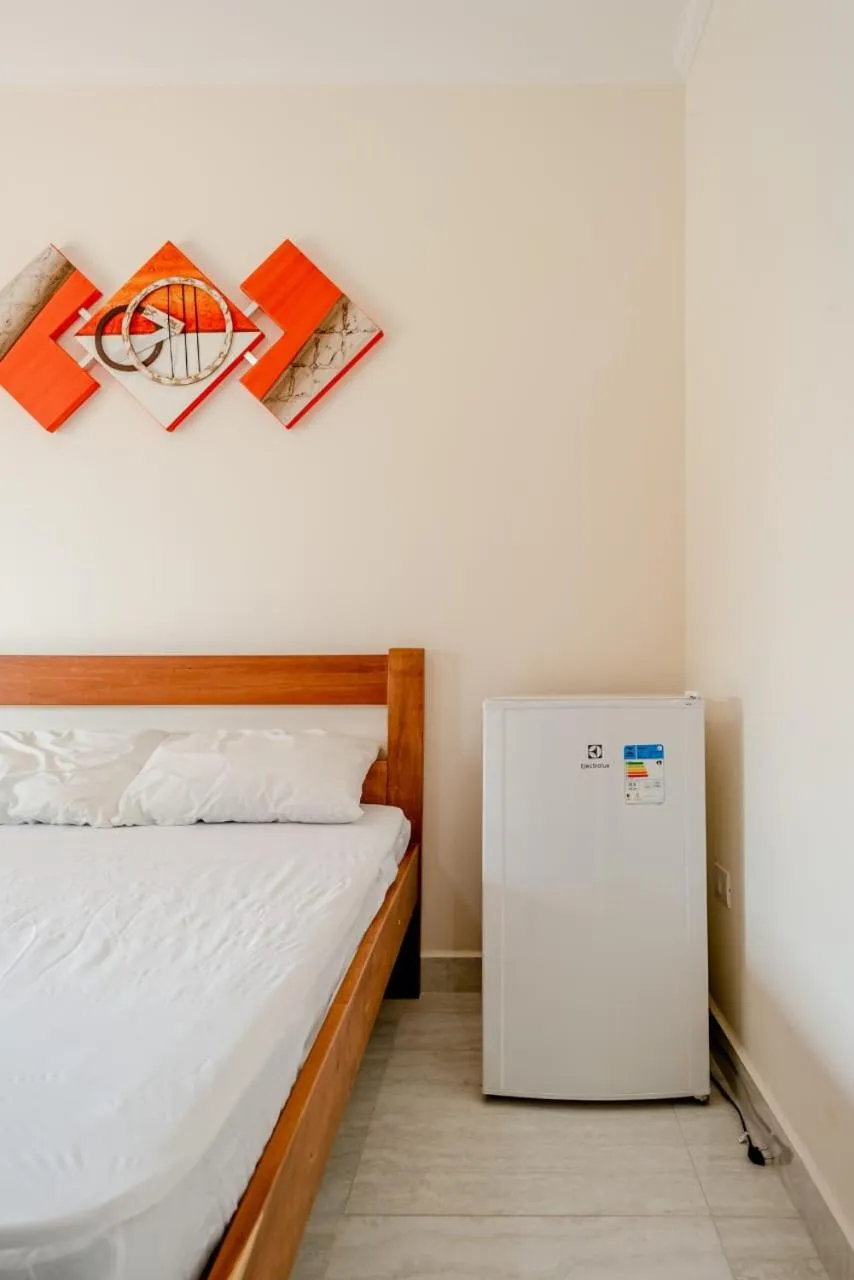 Bed in Pousada Oásis