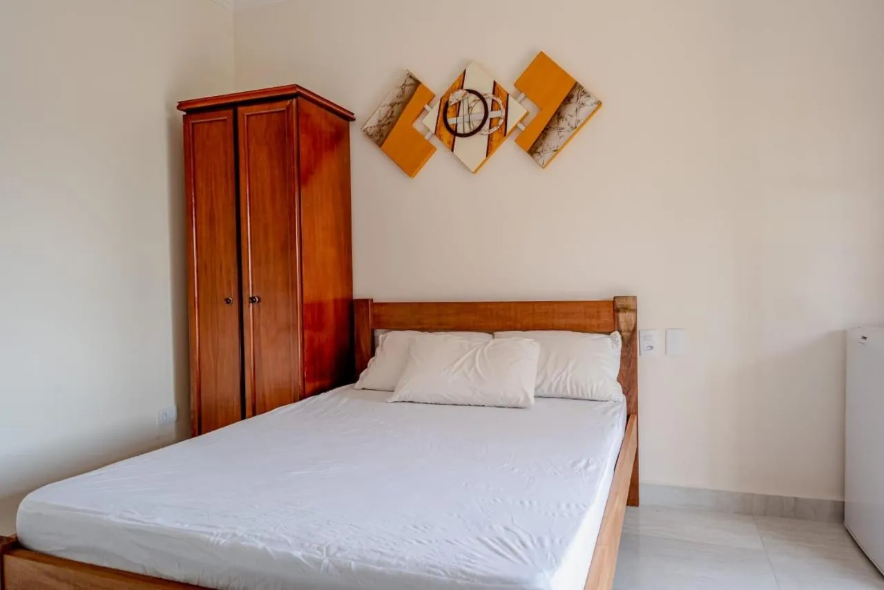 Bed in Pousada Oásis