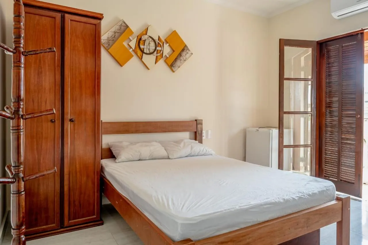 Bed in Pousada Oásis