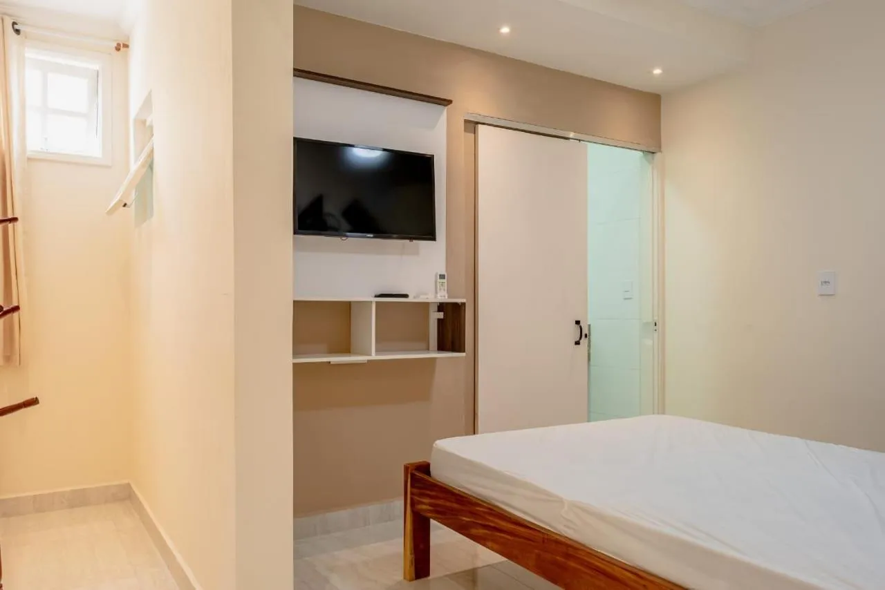 TV and multimedia, Bed in Pousada Oásis