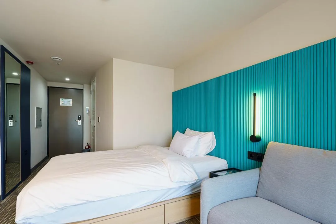 Bed in Little Prince Hotel&Condo