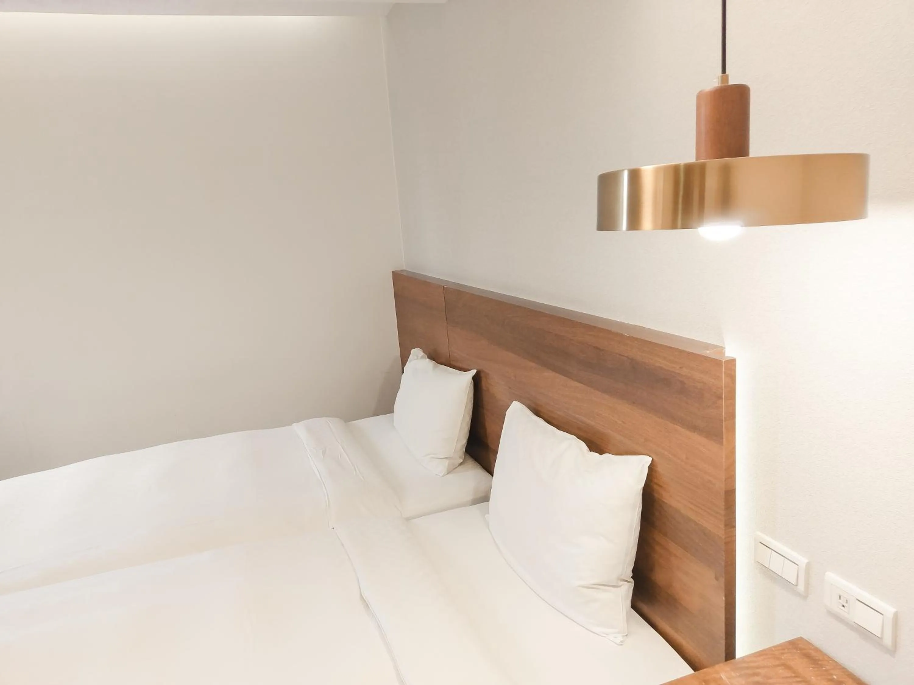 Bed in CHECK inn Express Taipei Station