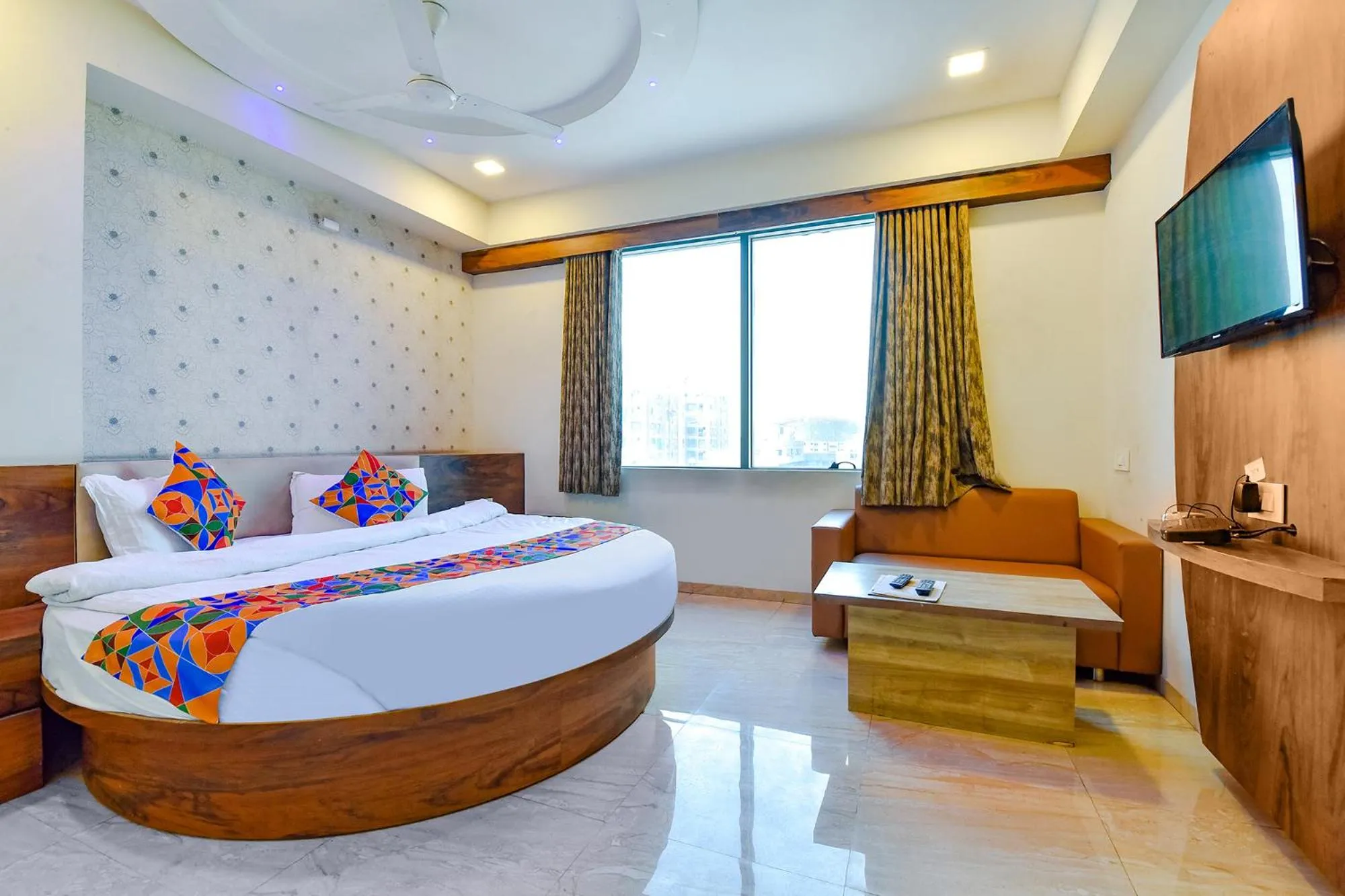 Communal lounge/ TV room, Bed in FabHotel Hill Park - Inside Suryam Trade Center
