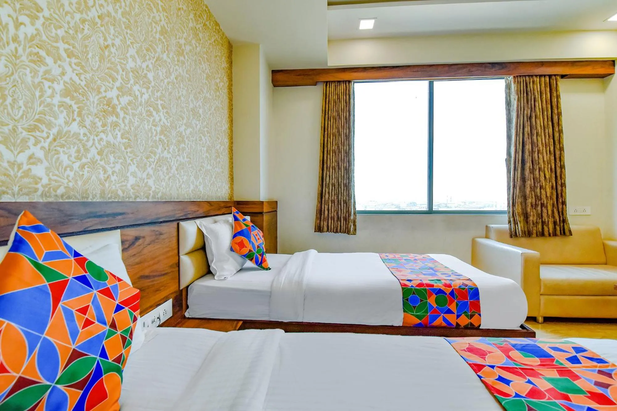 Living room, Bed in FabHotel Hill Park - Inside Suryam Trade Center