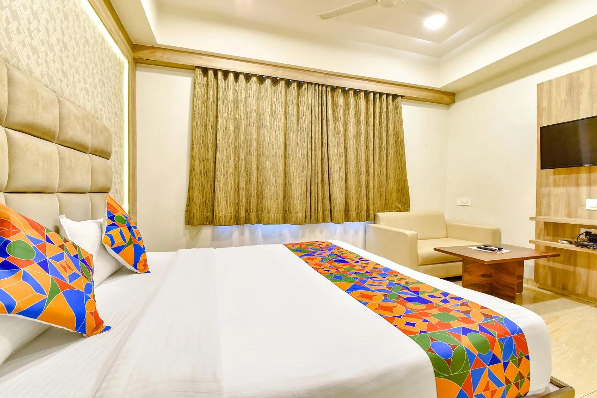 Communal lounge/ TV room, Bed in FabHotel Hill Park - Inside Suryam Trade Center