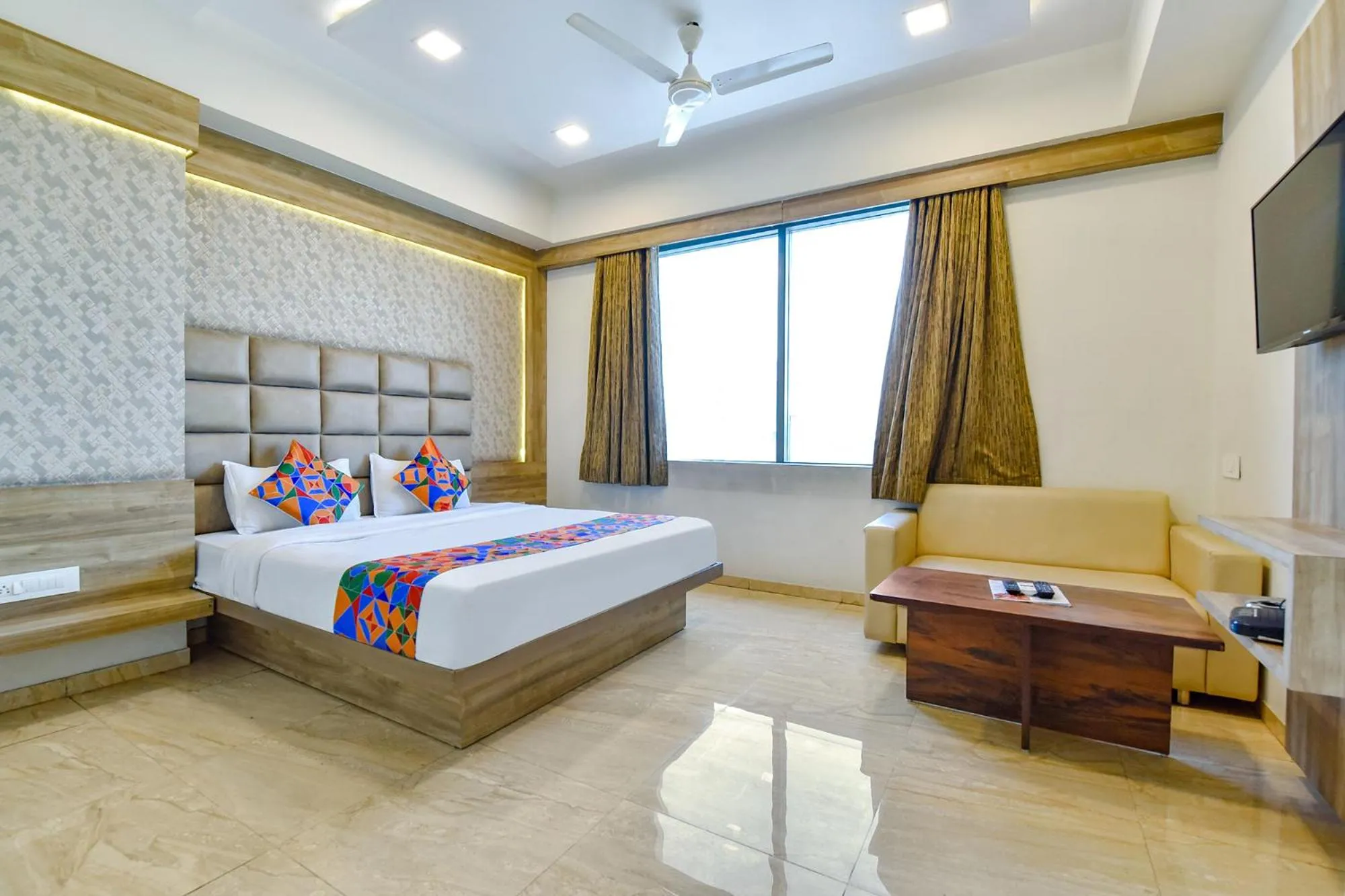 Communal lounge/ TV room, Bed in FabHotel Hill Park - Inside Suryam Trade Center