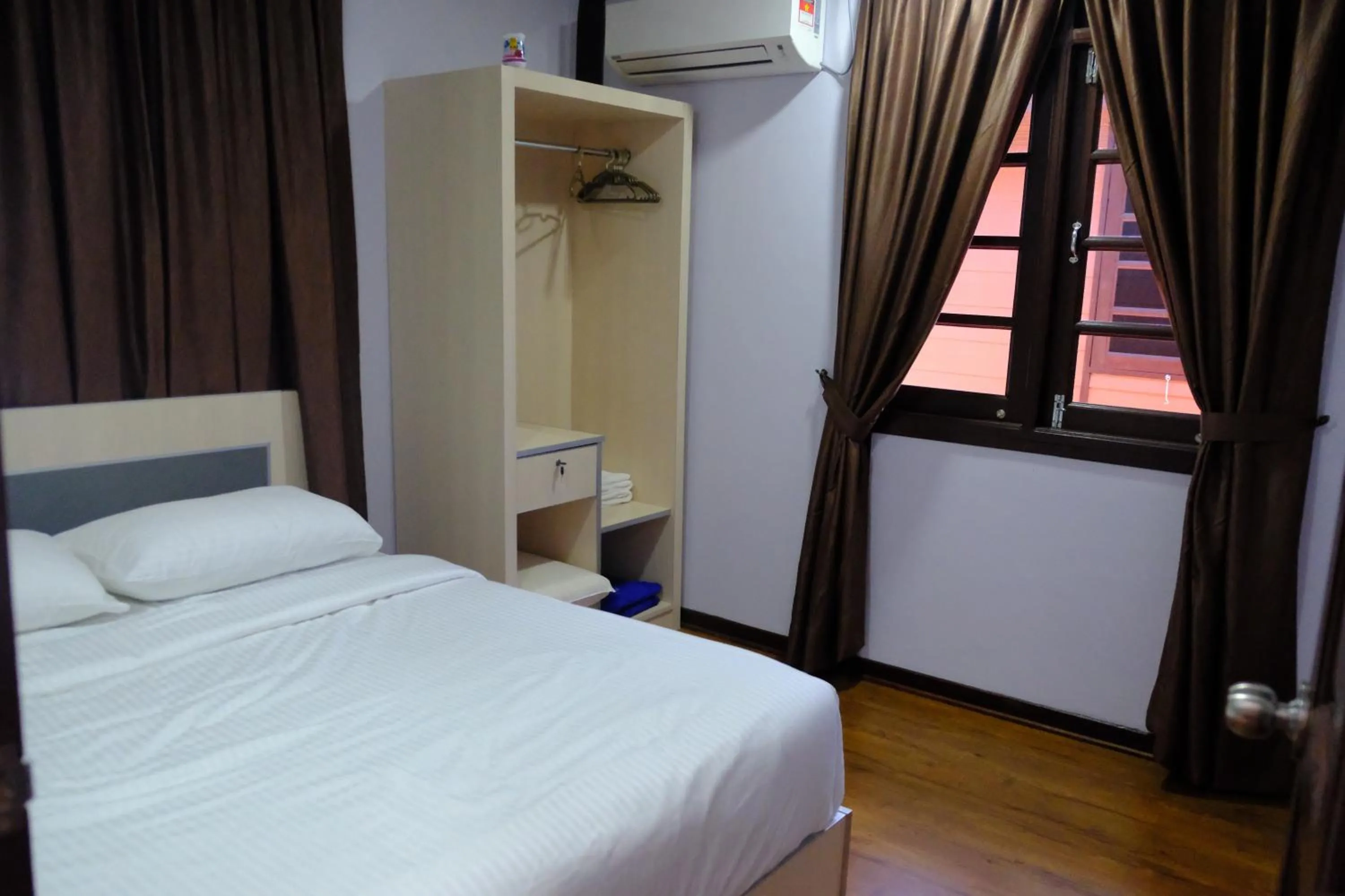Bed in D'Razna Chalet Pantai Seberang Takir