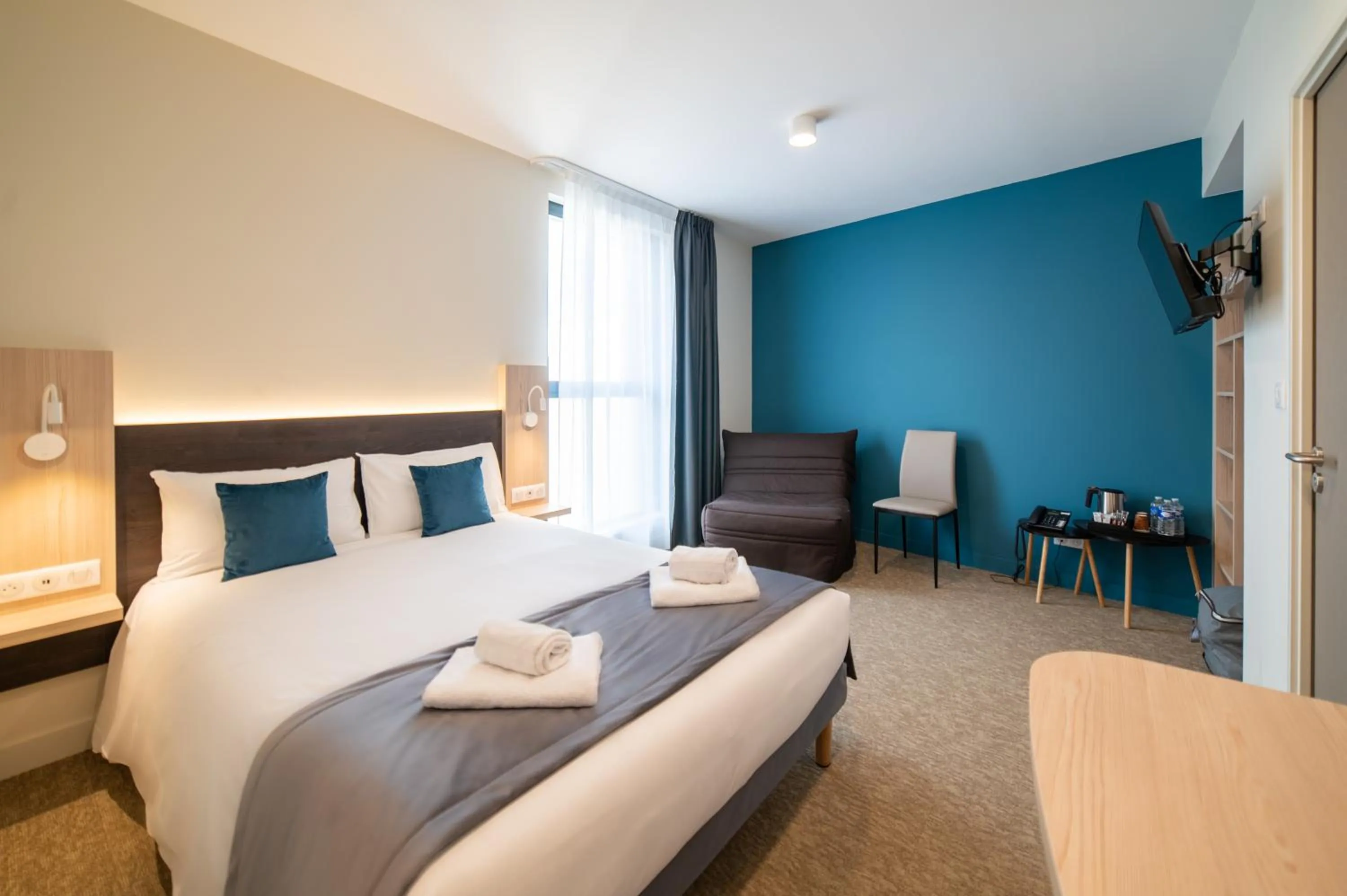 Bedroom, Bed in Hôtel - Restaurant Le MITIGANA