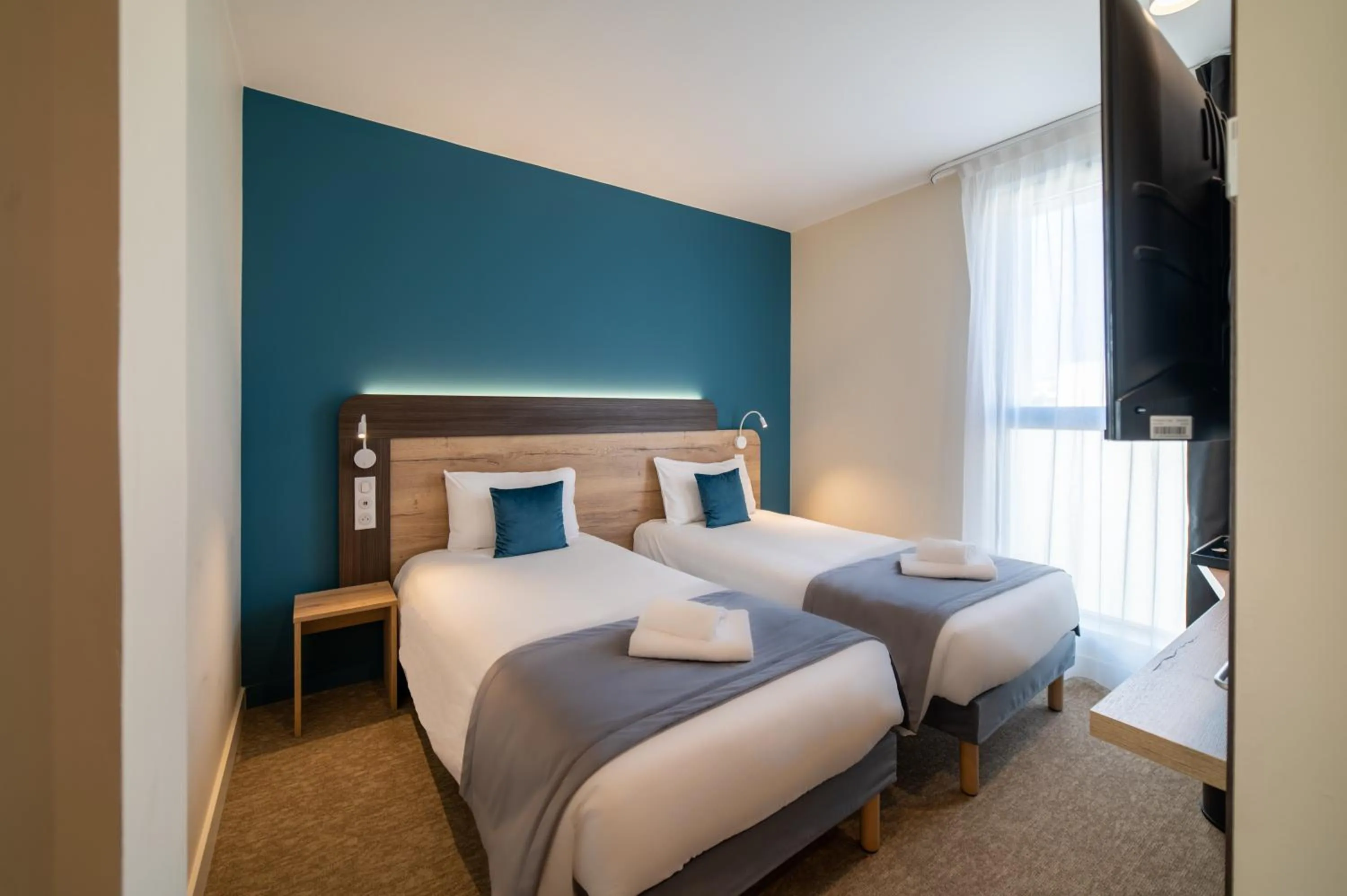 Bedroom, Bed in Hôtel - Restaurant Le MITIGANA