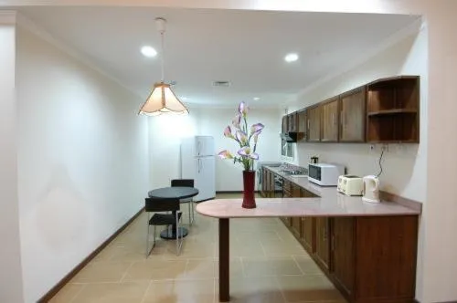 Kitchen or kitchenette in Ramee Suite Apartment 4