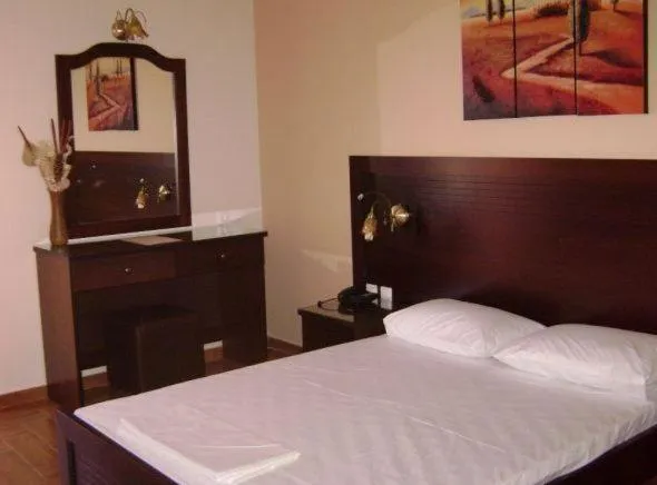 Bed in Pantheon Hotel & Suites