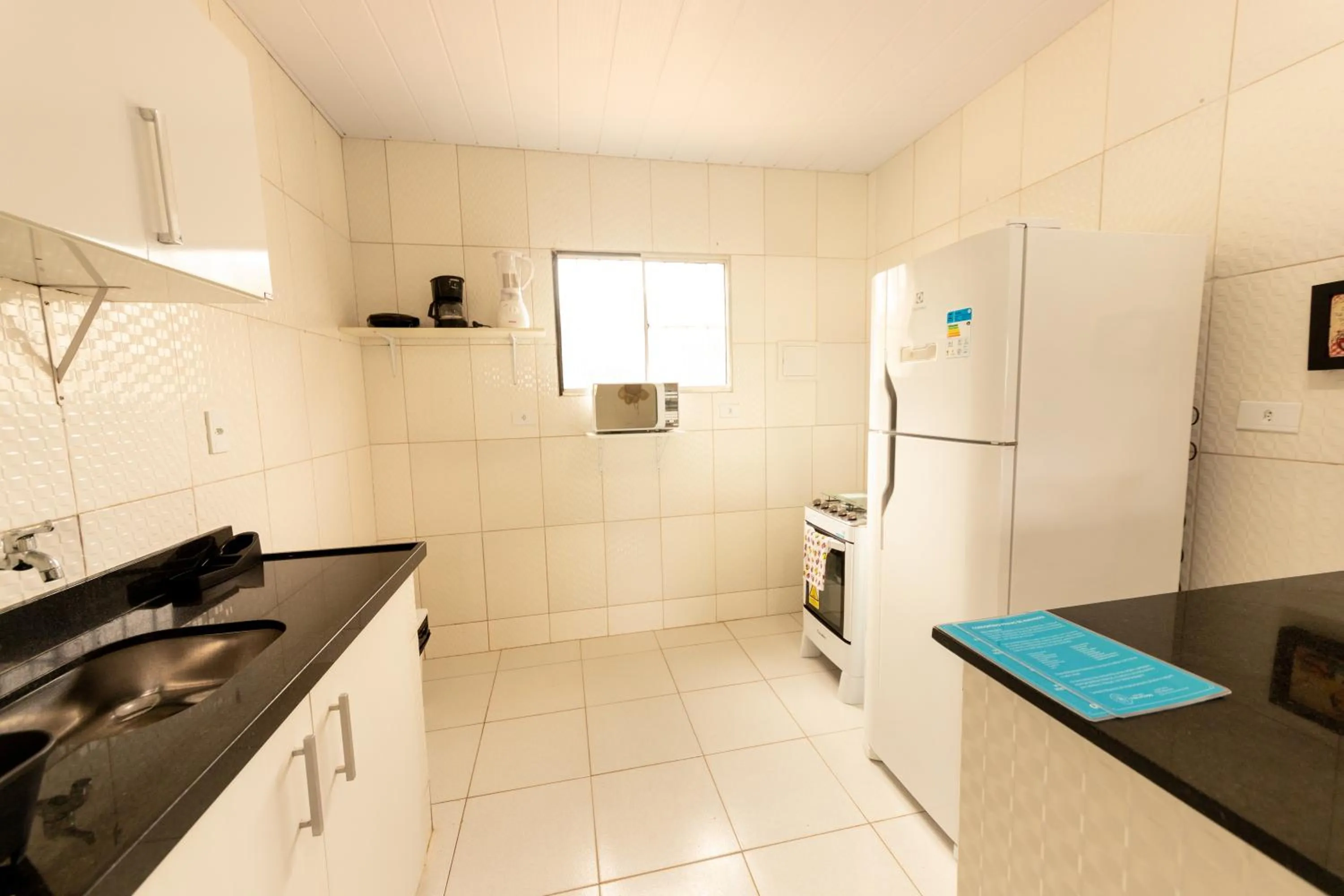 Communal kitchen in Condomínio Praias de Maragogi & Casas Deluxe