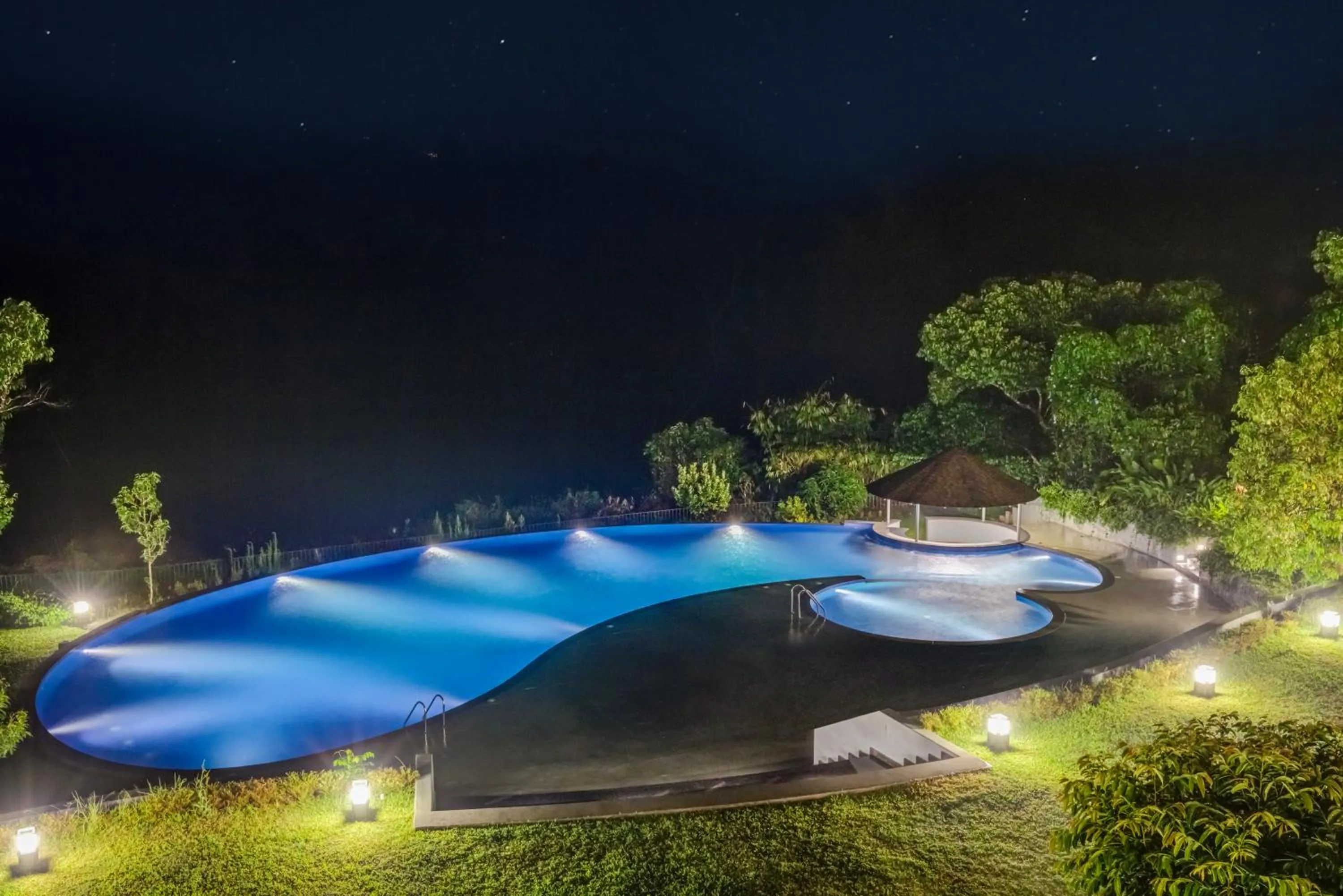 Swimming pool in Aurika, Coorg Luxury by Lemon Tree Hotels