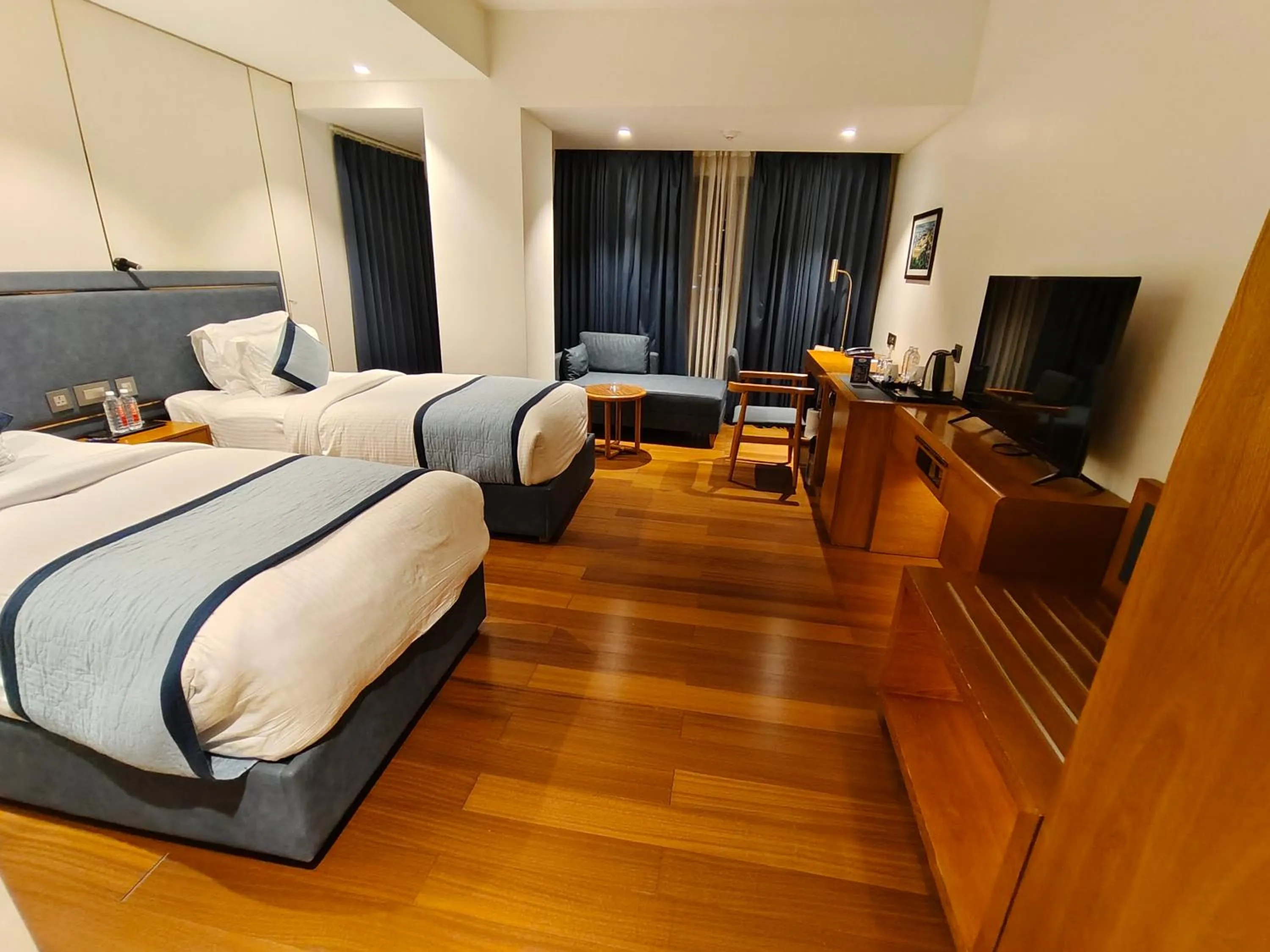 Photo of the whole room, Bed in Pride Hotel Udaipur