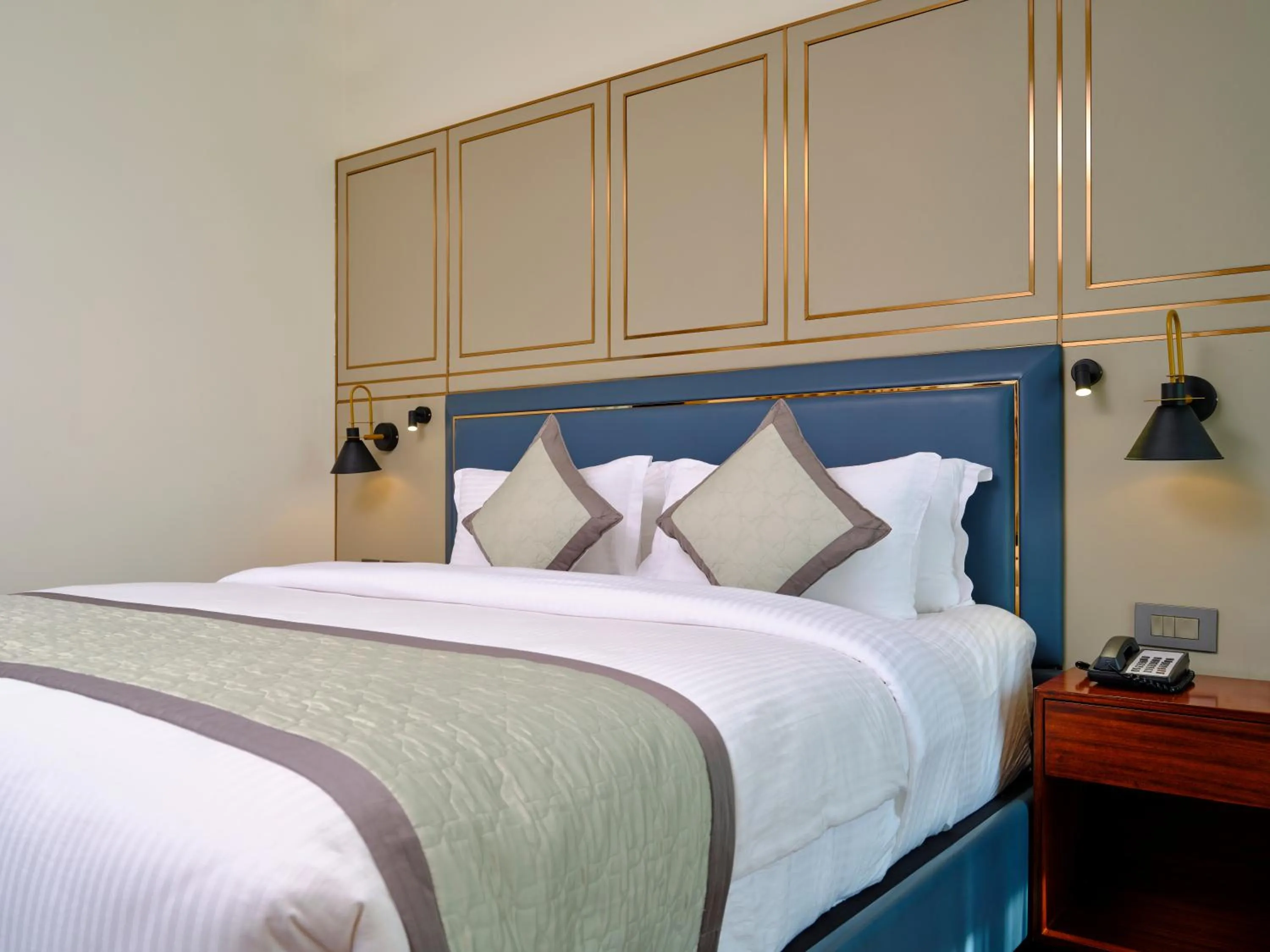 Bed in Pride Hotel Udaipur