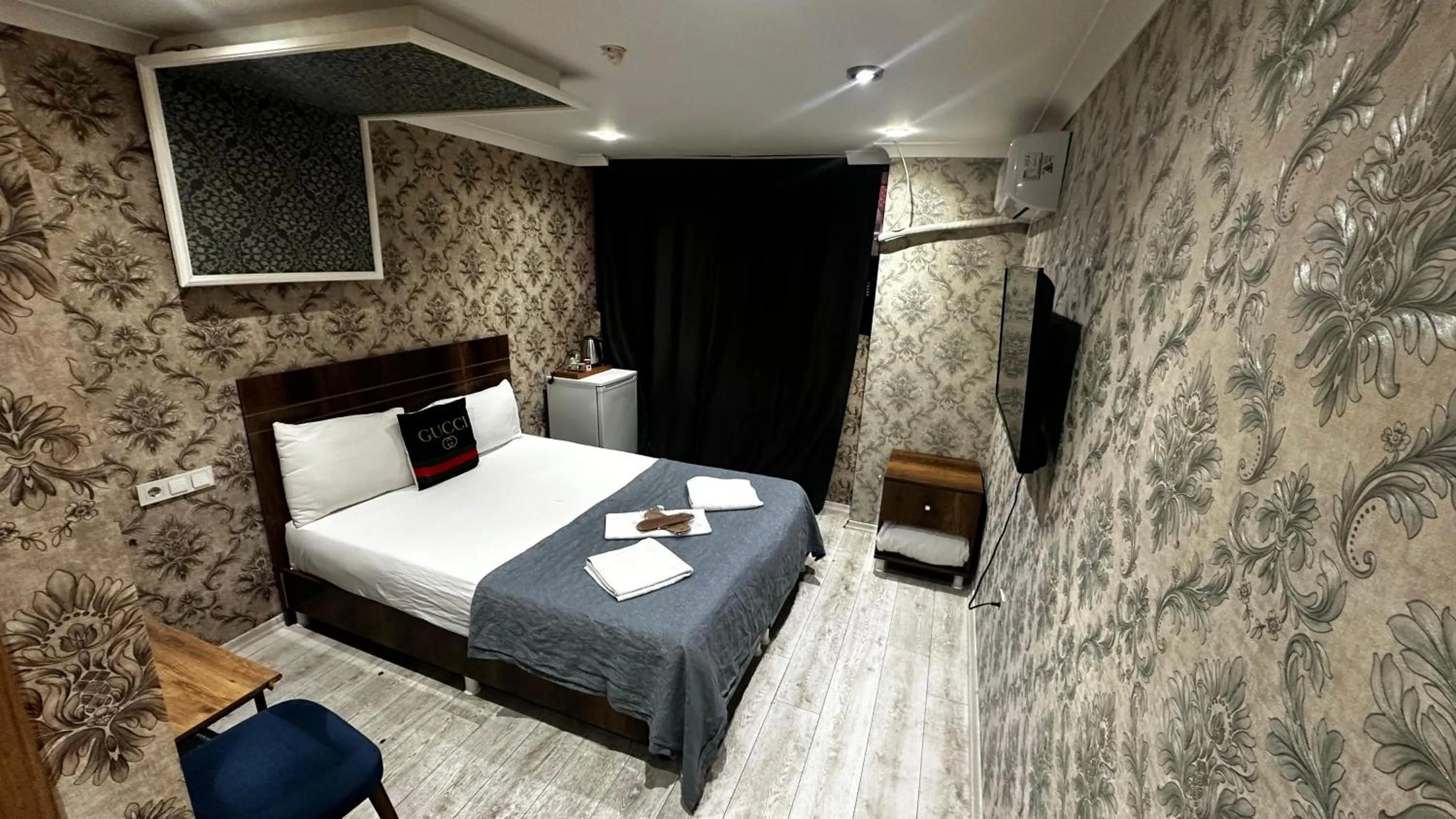 Bed in Grand Lara Hotel & Apartments