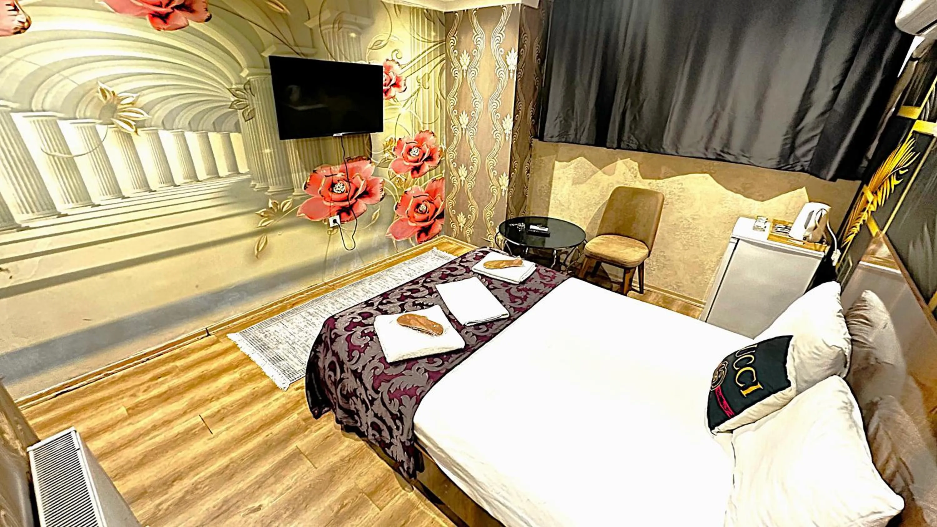 Bed in Grand Lara Hotel & Apartments