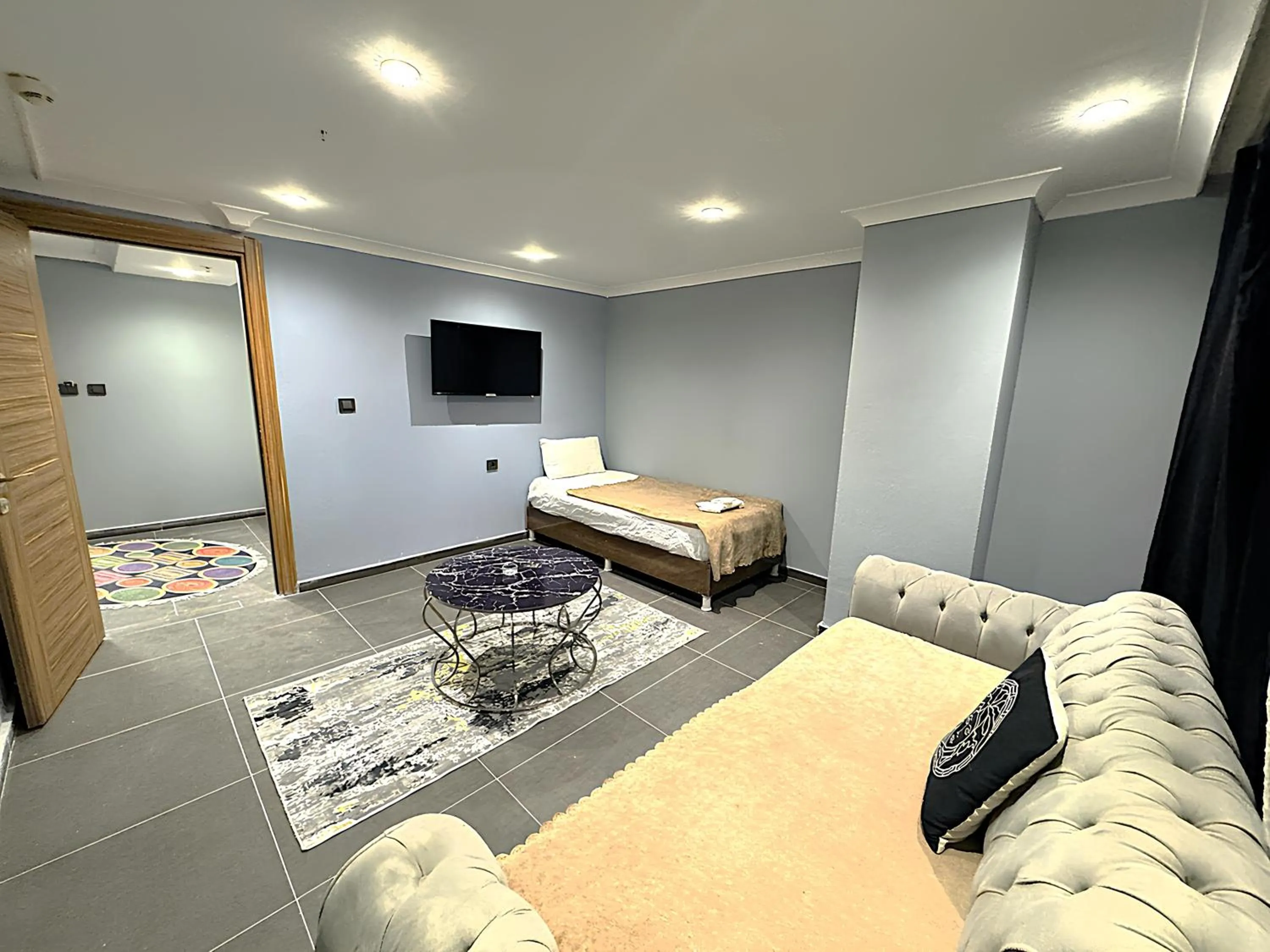 Bed in Grand Lara Hotel & Apartments