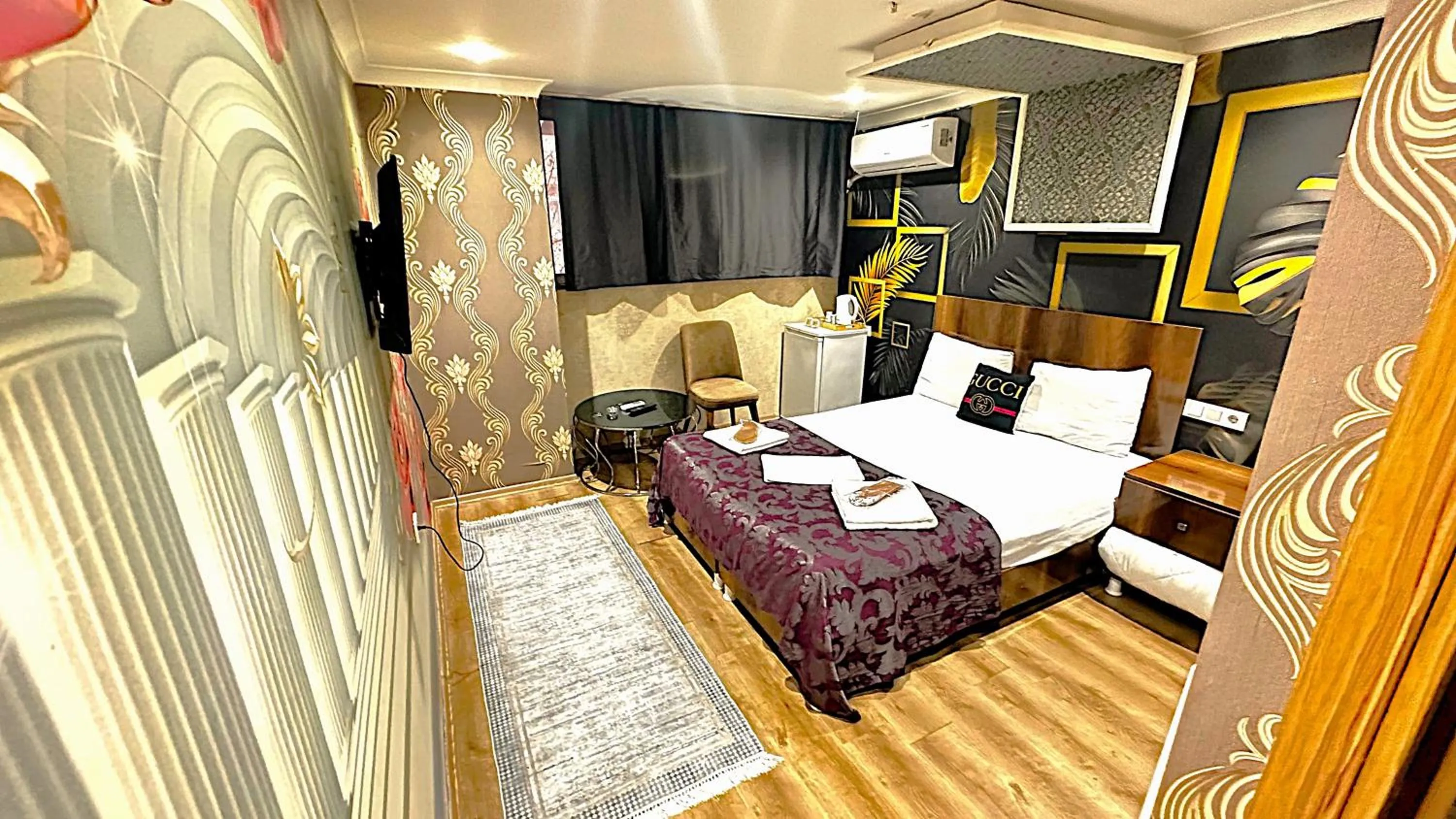 Bed in Grand Lara Hotel & Apartments