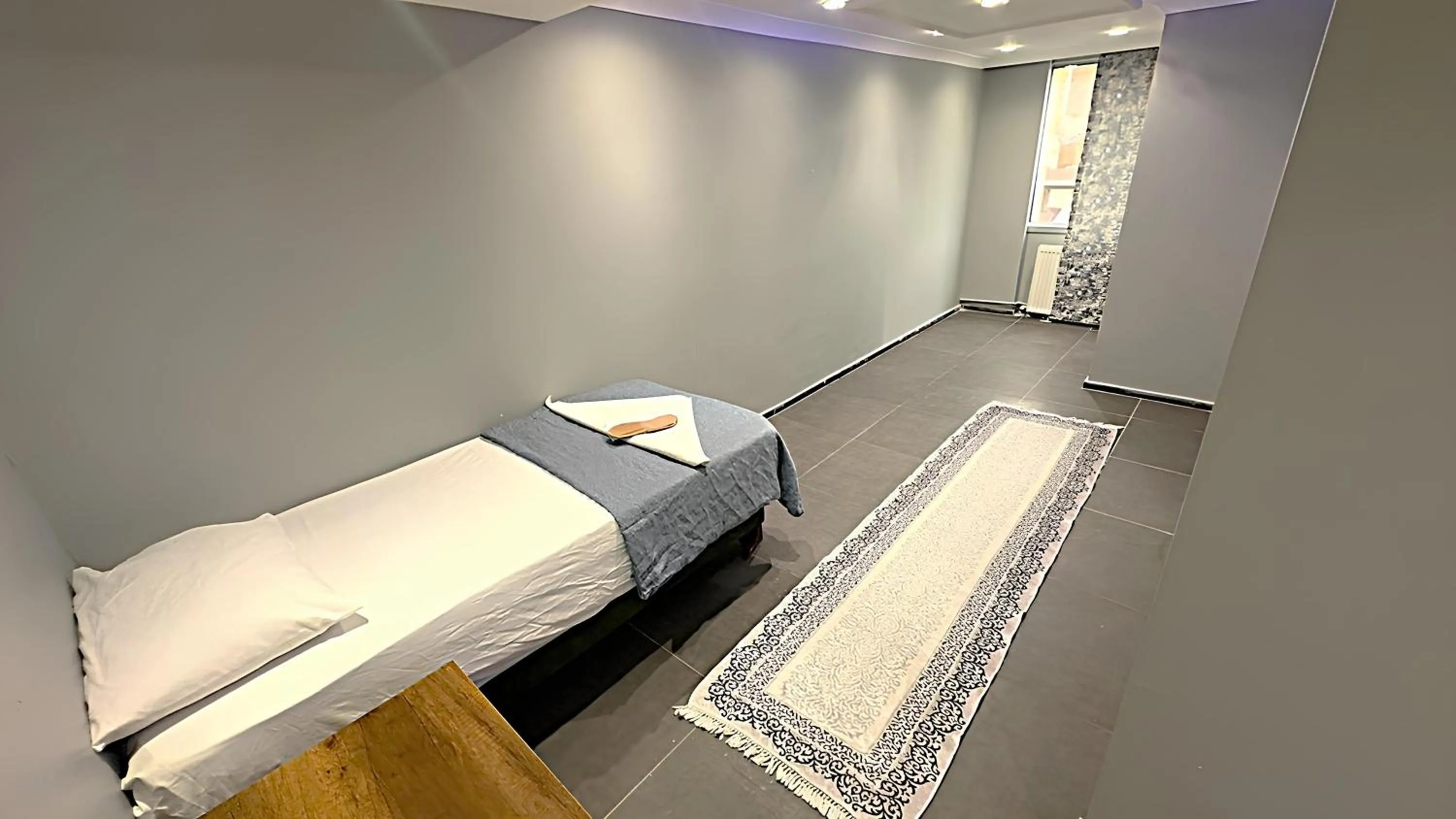 Bed in Grand Lara Hotel & Apartments