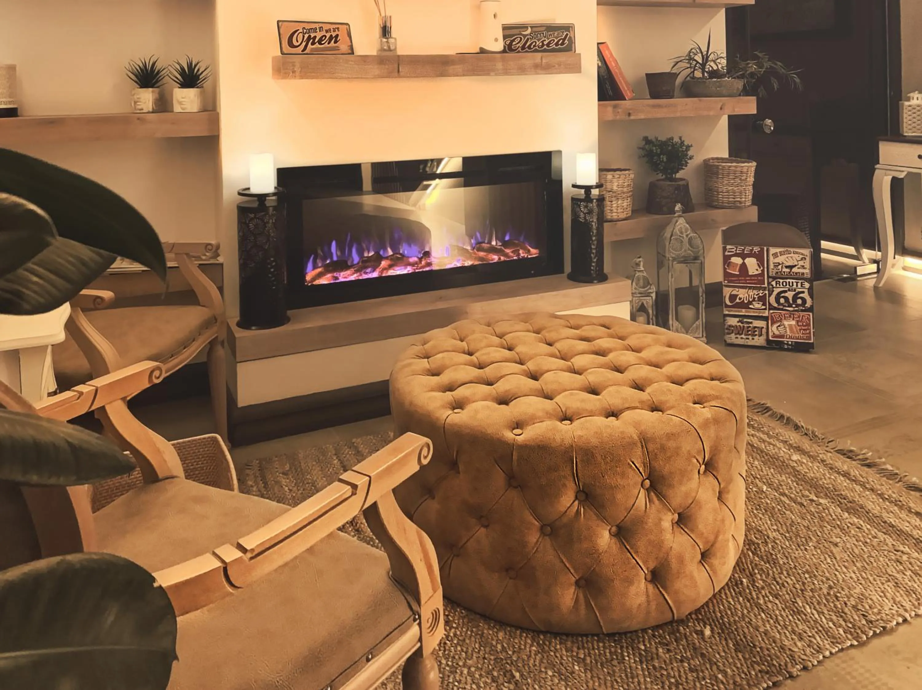 Communal lounge/ TV room in L'opera Deluxe Hotel
