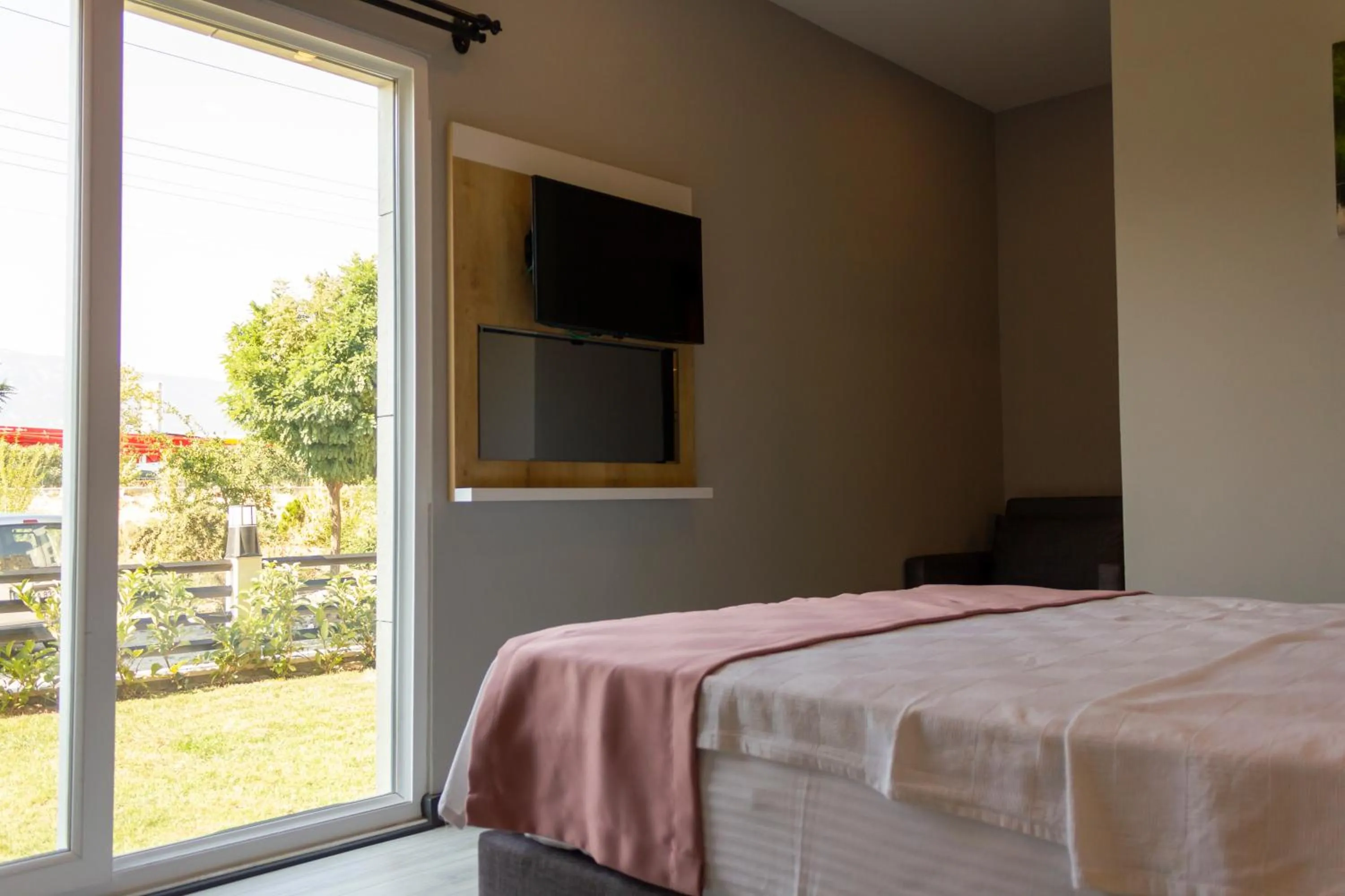 Bed in L'opera Deluxe Hotel