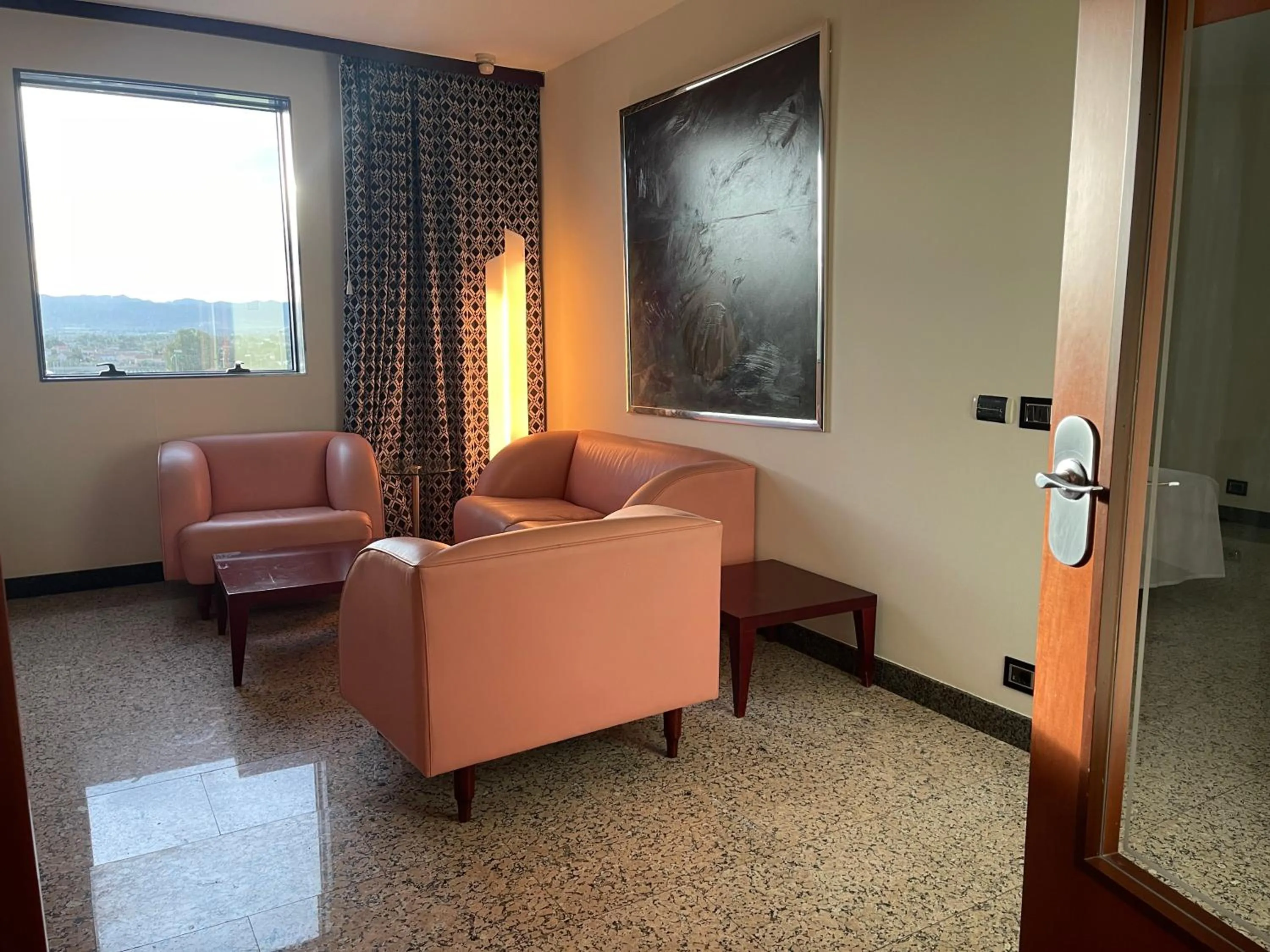 Living room in Hotel Amaltea by Executive Sport