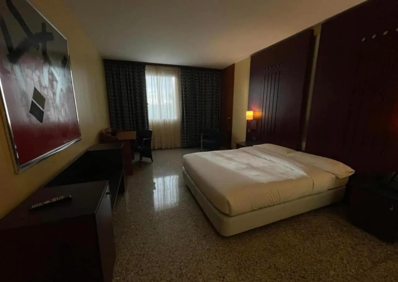 Bed in Hotel Amaltea by Executive Sport