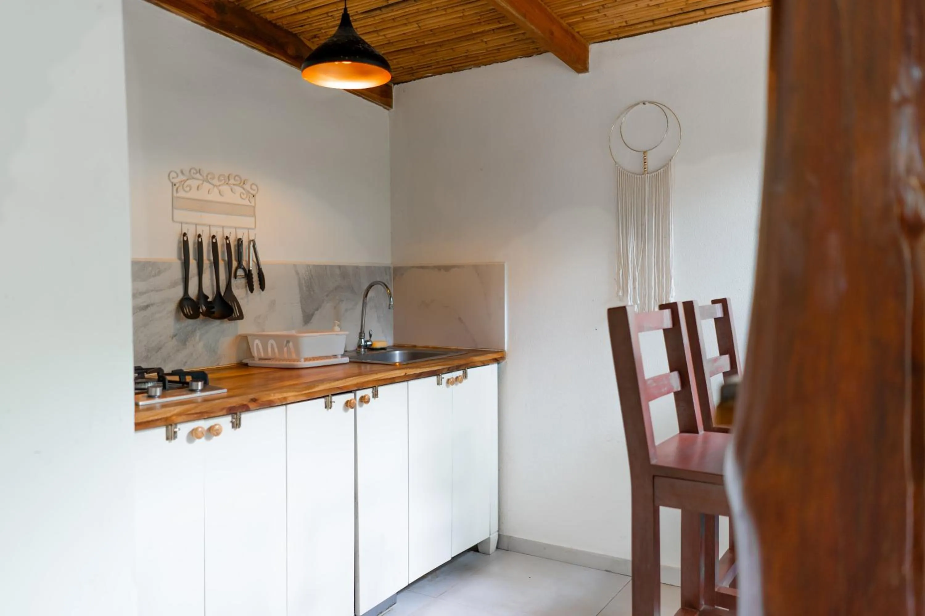 Kitchen or kitchenette in Banana Beach Bungalows